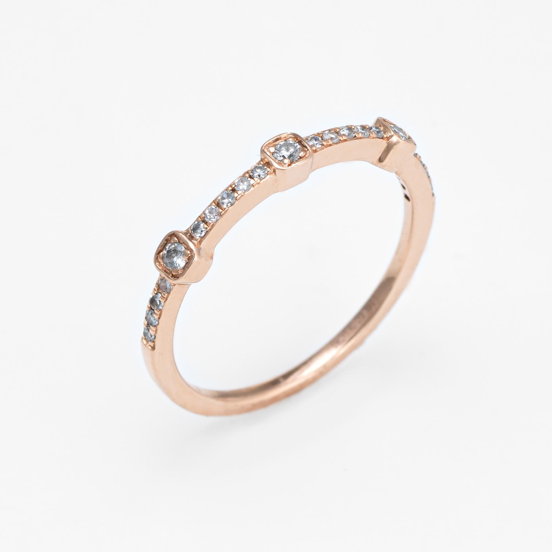 Finely detailed estate diamond ring, crafted in 14 karat rose gold. 

Single & round brilliant cut diamonds total an estimated 0.12 carats (estimated at H-I color and SI1-2 clarity)  

The simple and sweet ring features a band of diamonds in a