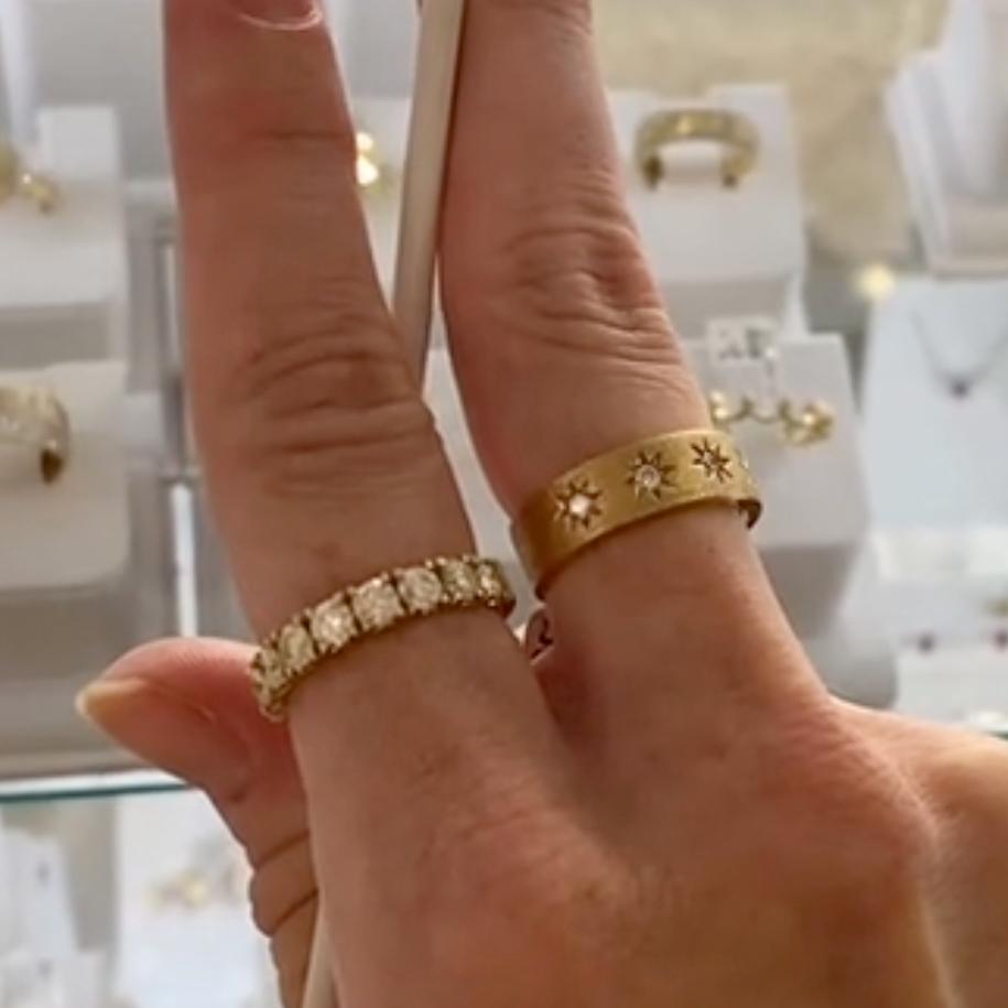 This starlight cigar band has a lovely matte finish, created in recycled 14 karat yellow gold. It has a matching bangle. The diamonds are flush-set within the band, like sparkling stars in a golden velvety evening. The details for this beautiful