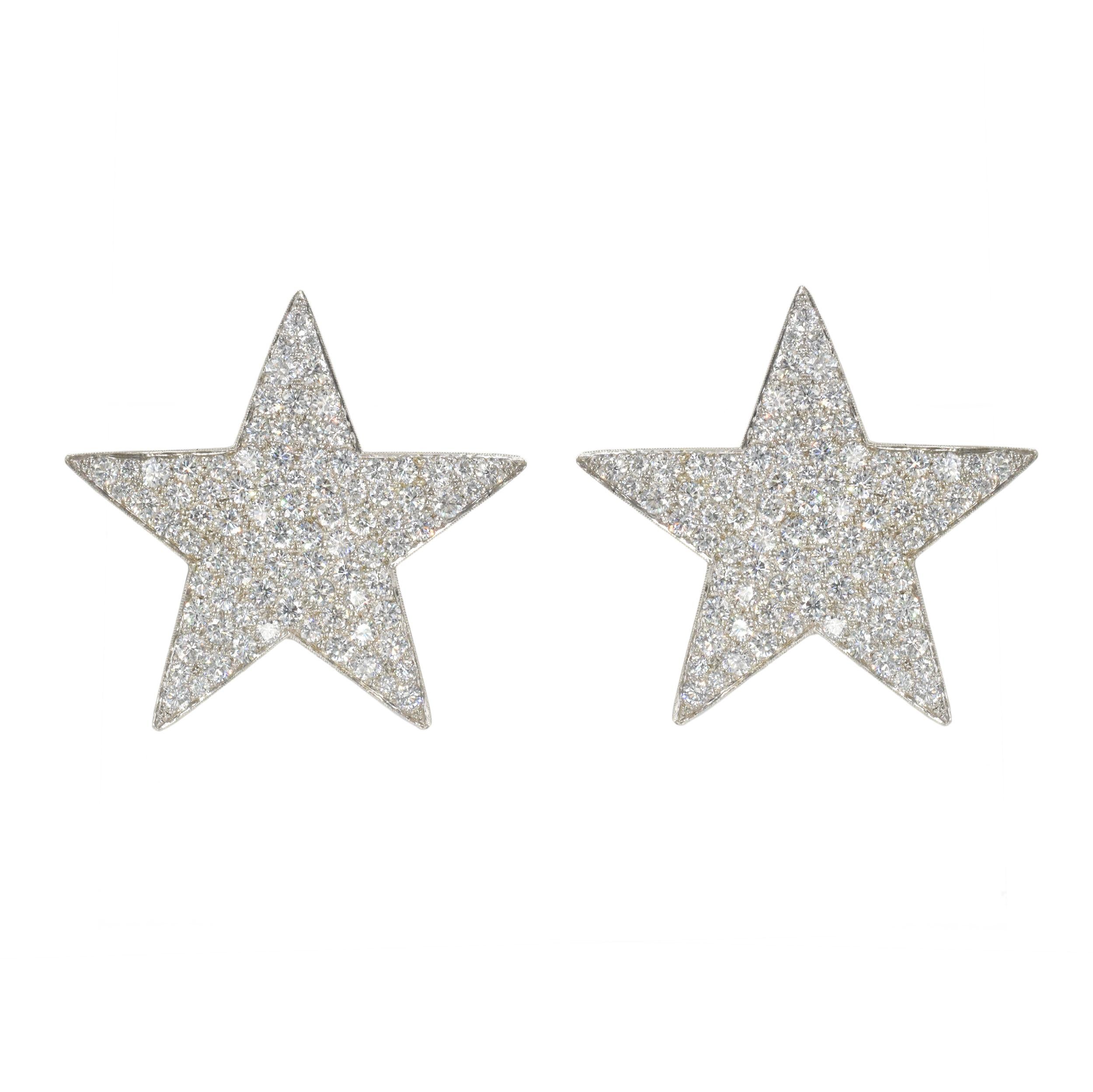 Pair of Diamond Star Ear-clips in 18k white gold. This pair of earrings is created in
a “star” motif. Encrusted with round brilliant cut diamonds with a total of 15.10 carats Color: F/G, Clarity: VS.
 Equipped with the post and omega back closing.