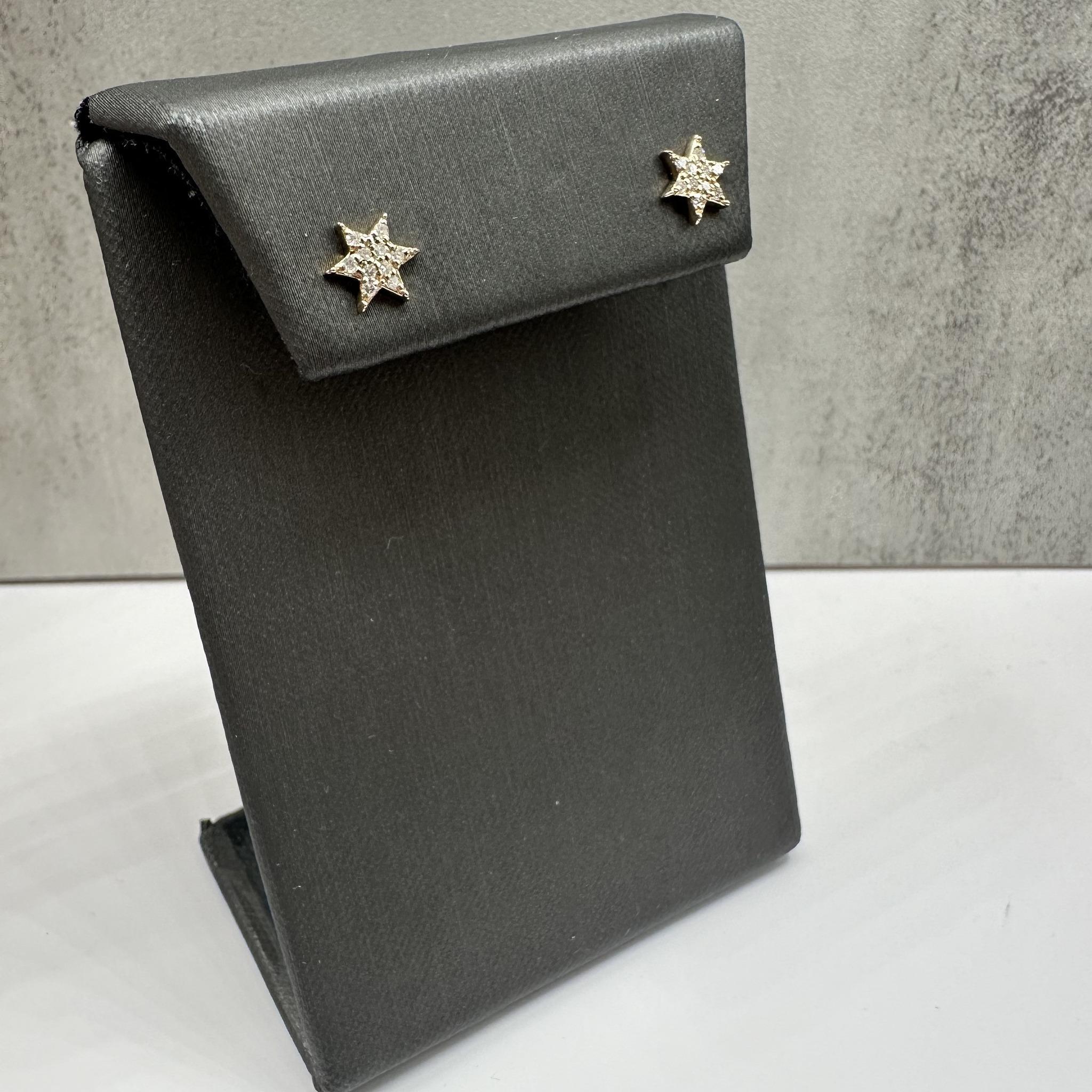These elegant Diamond Star Earrings in 14kt yellow gold feature 0.17ctw of natural GH SI round single cut diamonds, adding a subtle sparkle to the star-shaped design. Weighing just 1.09 grams, they are lightweight and perfect for everyday wear. The