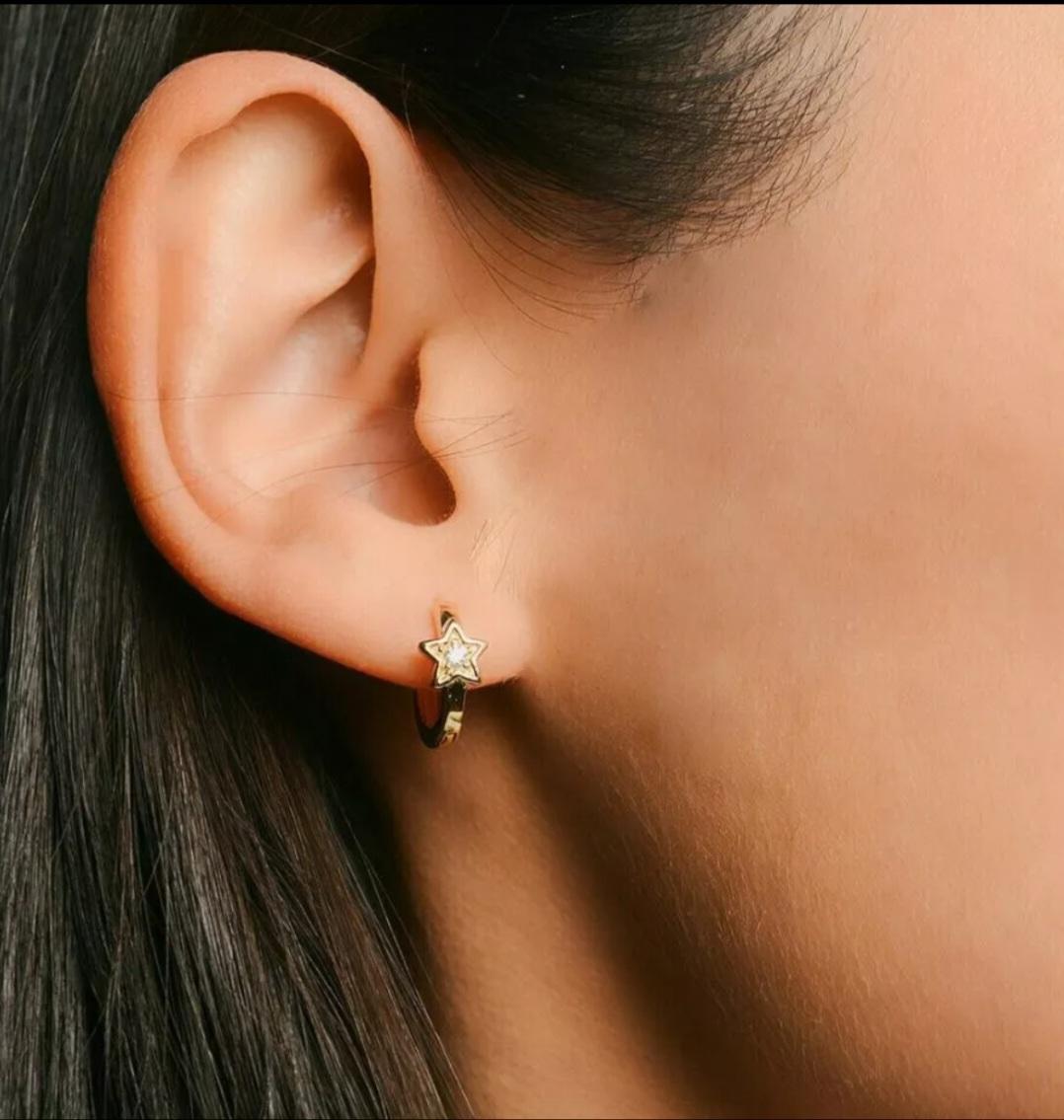 Diamond Star Hoop Earrings 14K Solid Gold Mini Hoop Earring Christmas Gift.

Number of Diamonds
2
Shape
Round
Closure
Clip-On
Metal
Yellow Gold
Item Length
10 mm Approx
Secondary Stone
Diamond
Main Stone
Diamond
Material
14K Solid Gold, Natural
