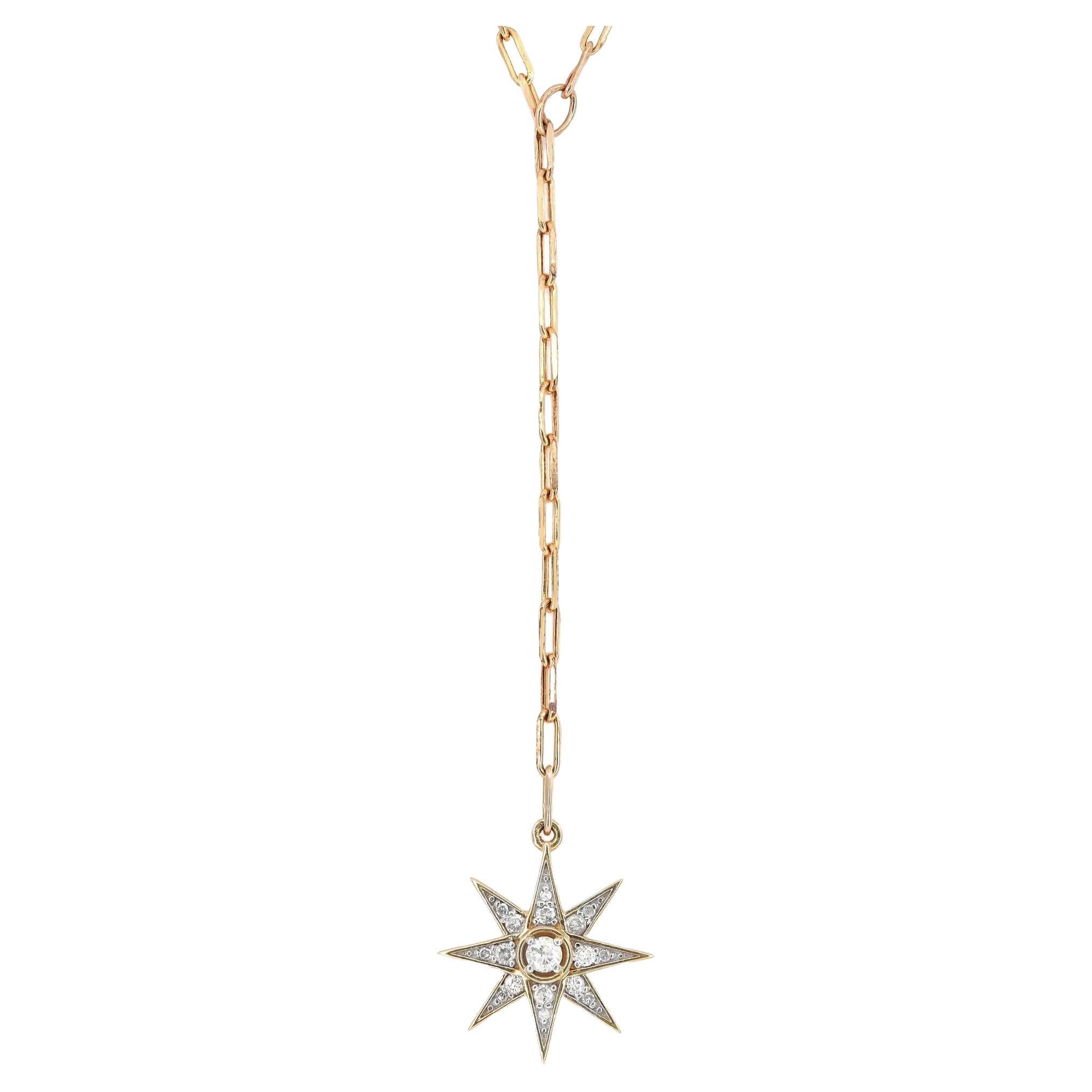 So dainty and pretty that we know it will look wonderful for any occasion. Crafted in 14K Yellow Gold. This beautiful diamond lariat necklace features a link chain with a diamond-studded star drop. Total diamond weight: 0.16 carat. Diamond color I