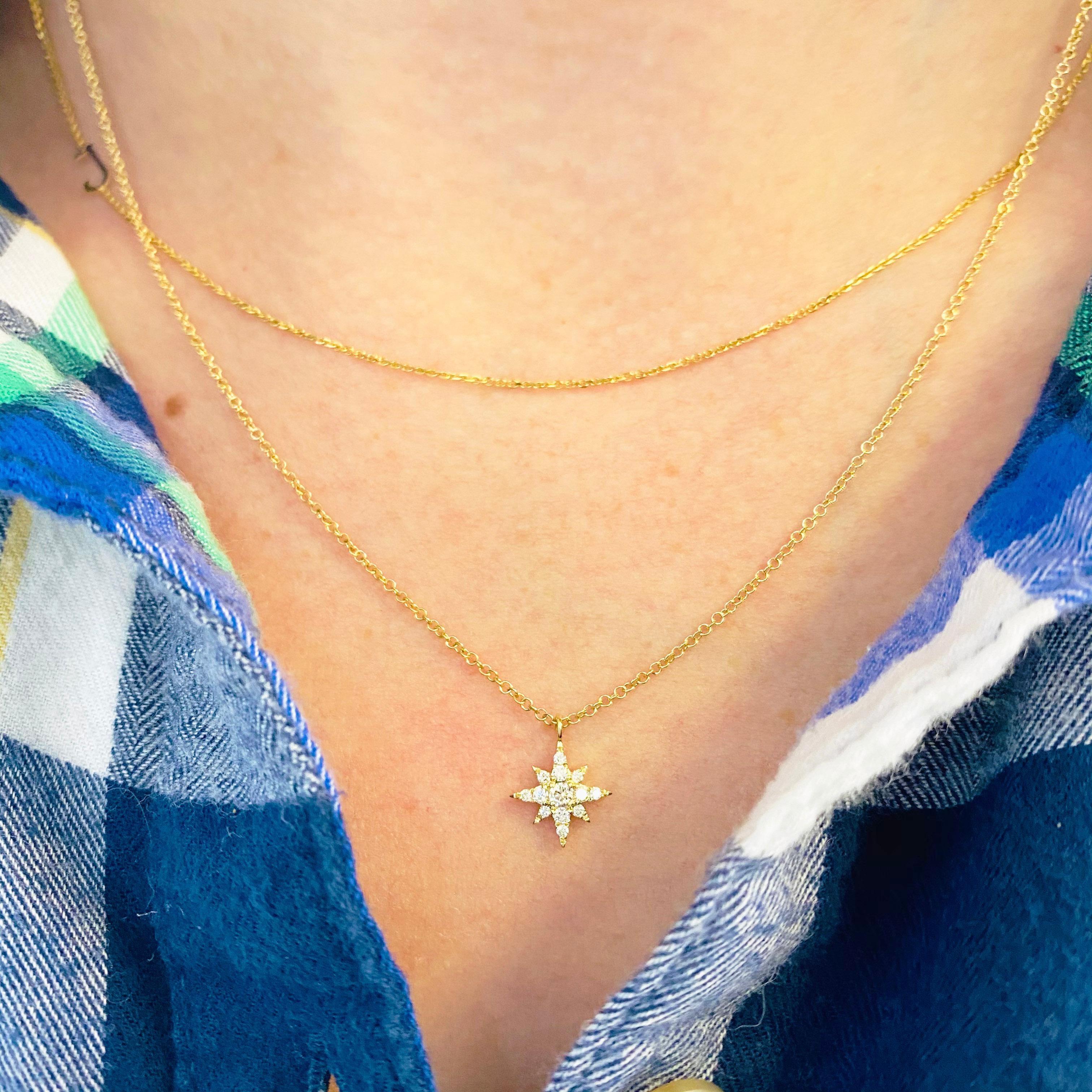This gorgeous 14k yellow gold North Star pendant dripping with diamonds is sure to put a smile on anyone's face! This necklace looks beautiful worn by itself and also looks wonderful in a necklace stack. This necklace would make a wonderful gift for