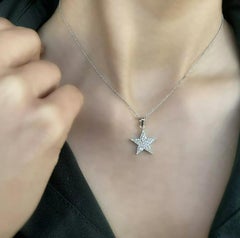 Collier pendentif étoile céleste en or massif 14 carats et diamants