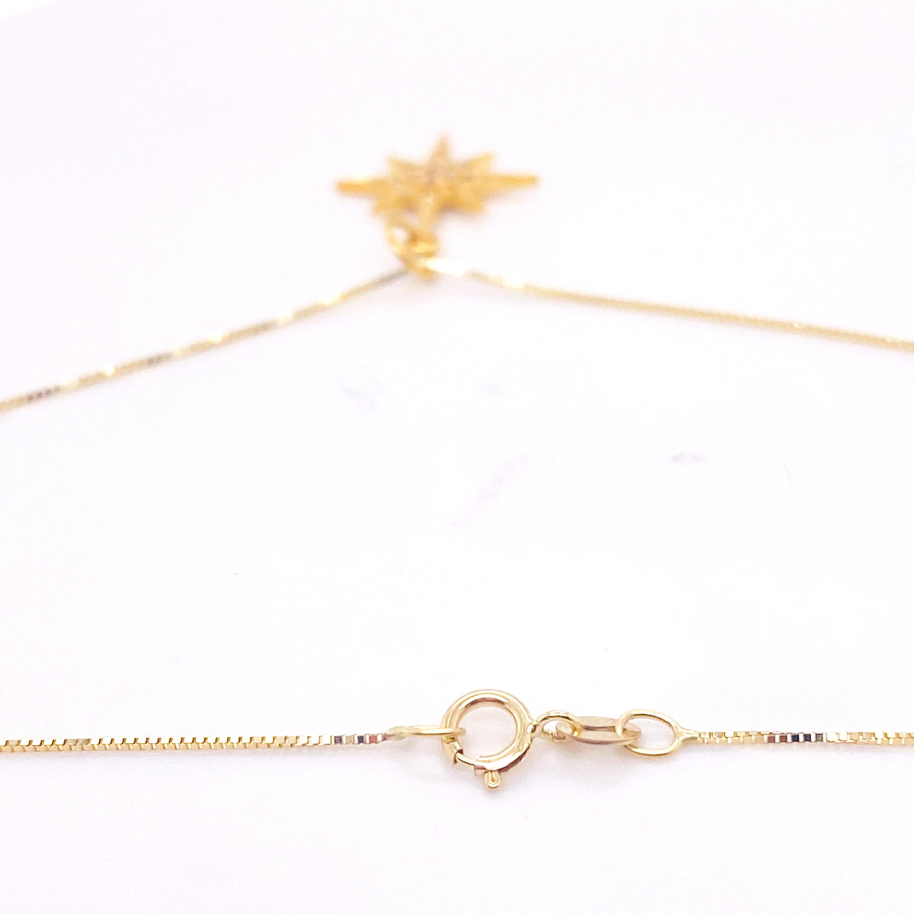 gold north star necklace