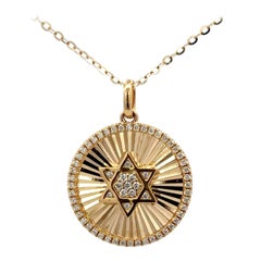 Collana con ciondolo scanalato con stella di David 0,15 carati in oro giallo 14 carati