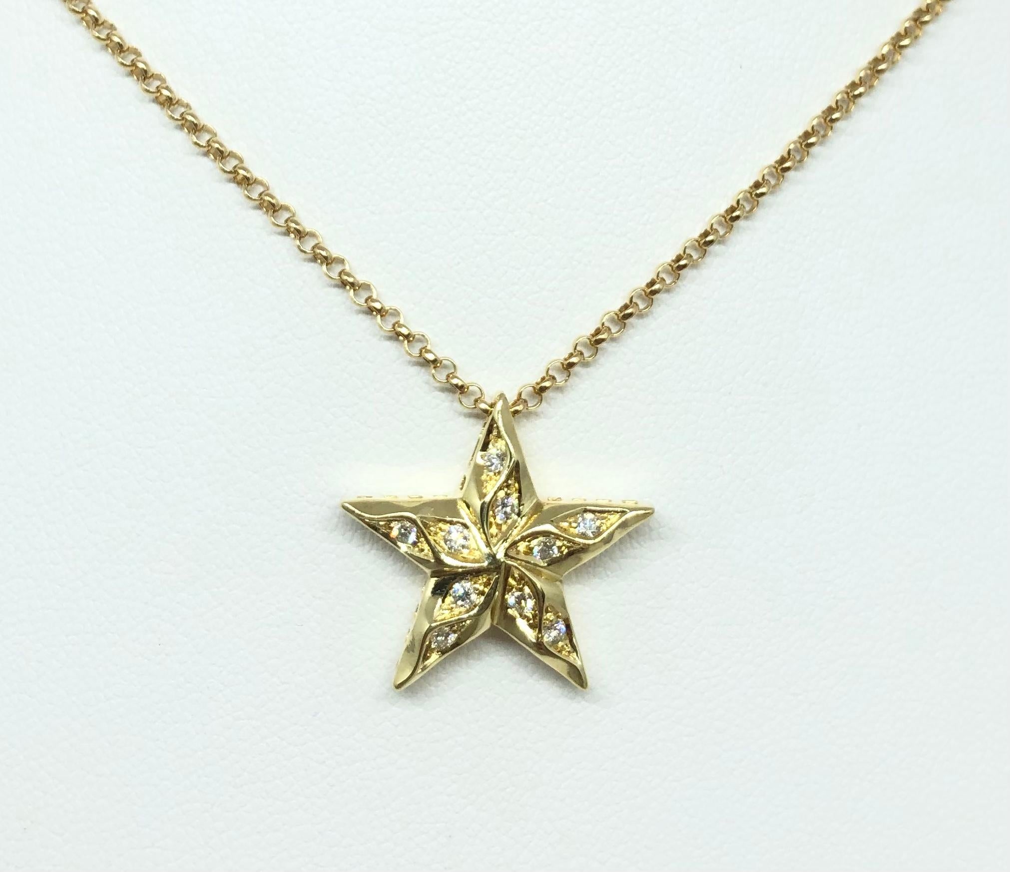 Contemporary Diamond Star Pendant Set in 18 Karat Gold Settings For Sale