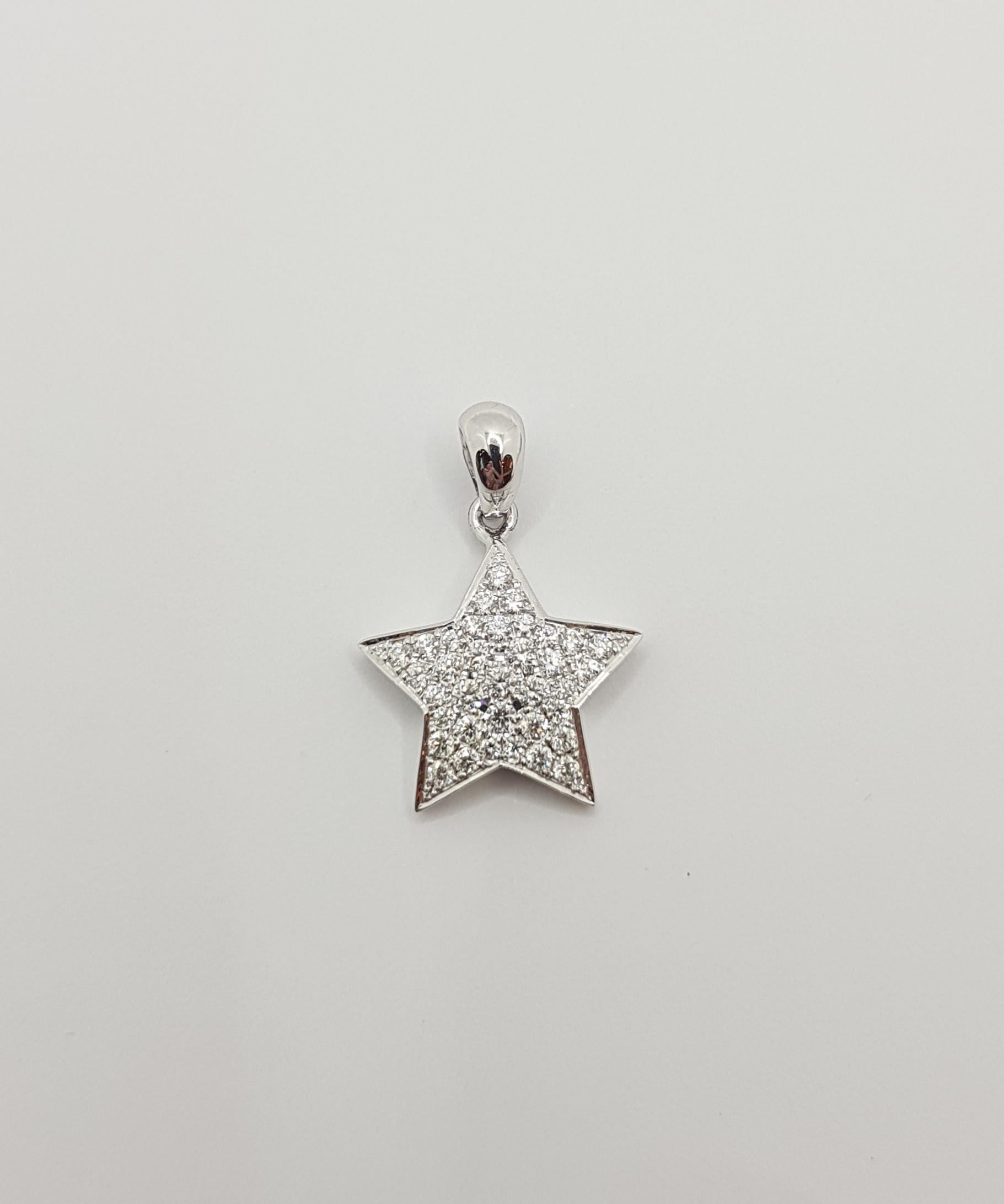 Contemporary Diamond Star Pendant Set in 18 Karat White Gold Settings For Sale