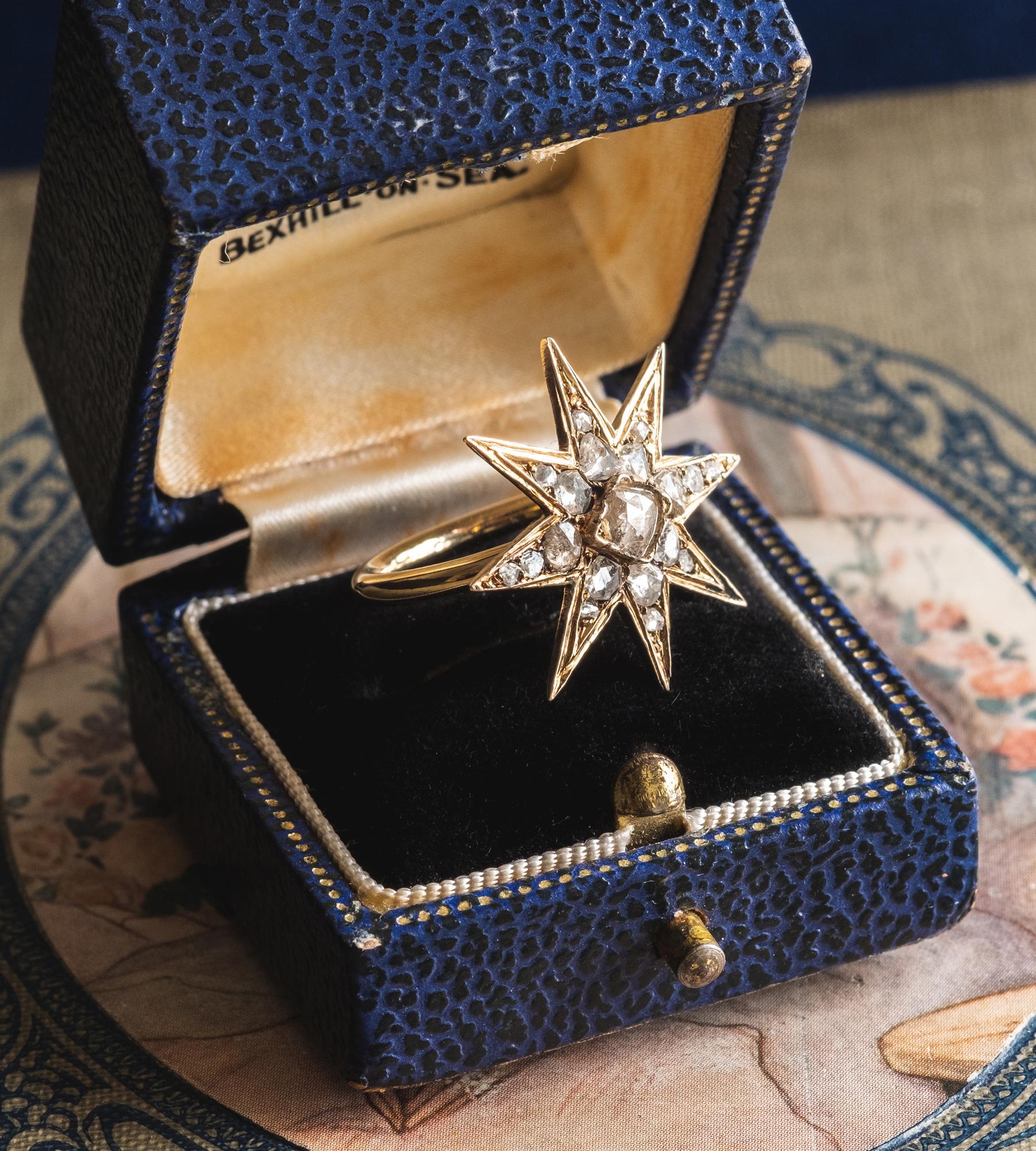 This exceptional piece is an original Georgian brooch circa 1813 that we have transformed into a stunning cocktail ring. 
The Star Ring features 19 Old Cut diamonds and a new round 9ct gold band. 
Celestial symbols were prominent in Georgian