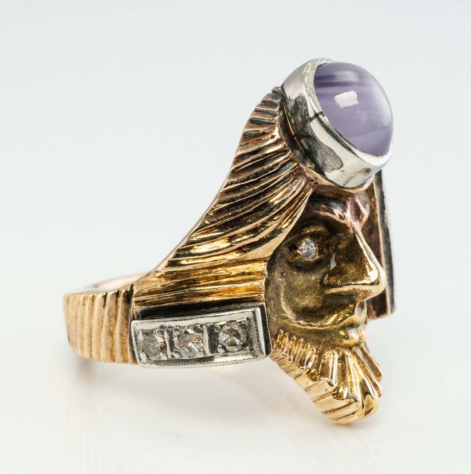 This unique and one of a kind vintage ring is finely crafted in solid 14K Yellow gold and made in the shape of a man's face. The details of this piece are amazing, it is like a miniature sculpture made of gold. The genuine Earth mined white gold