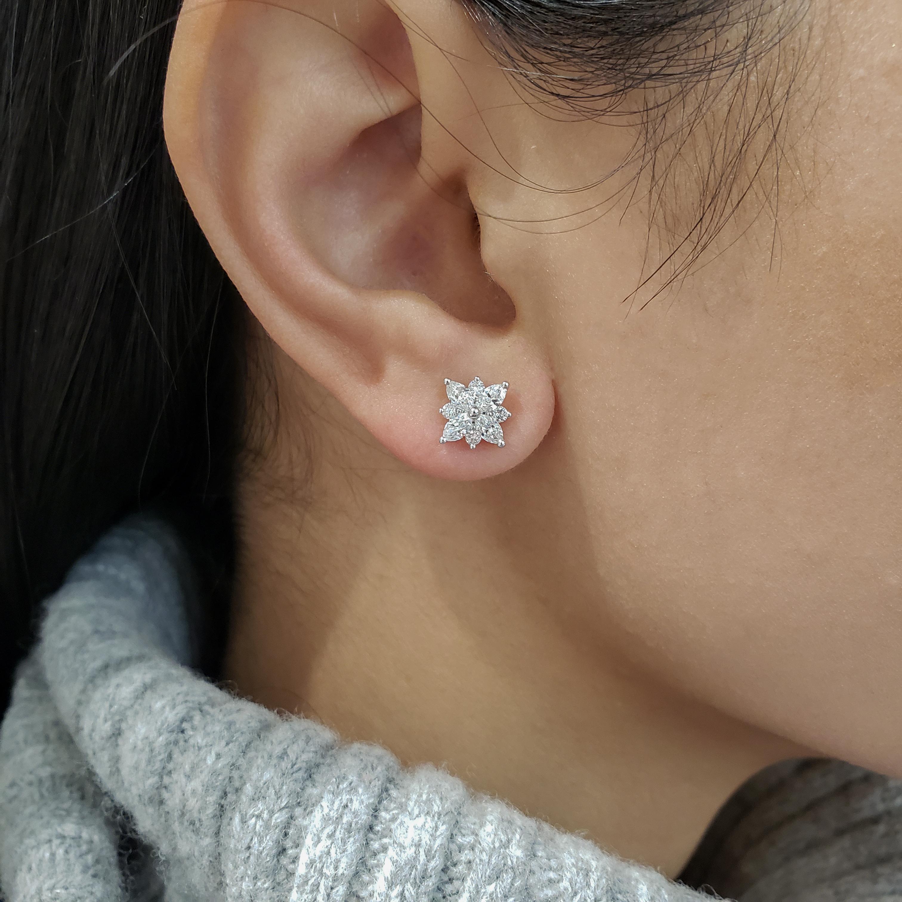 This sophisticated pair of stud earrings features a dazzling starburst design set with brilliant round and marquise cut diamonds in 18k white gold. Total weight of the diamonds 0.99 carats. Perfect for everyday wear.

Style available in different