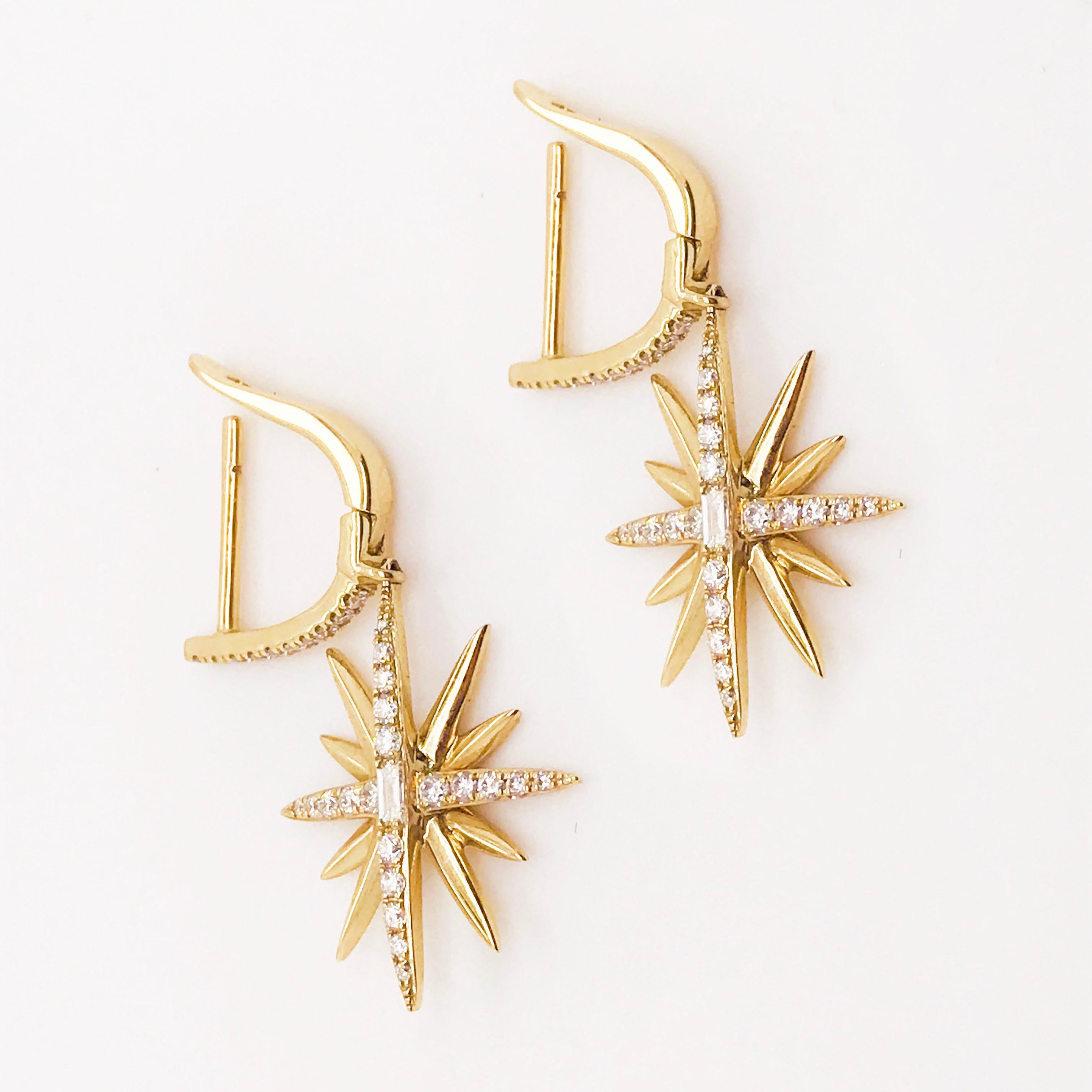 These diamond starburst designer earrings are bold and beautiful! Made in 14K gold with genuine, natural diamonds. The earrings have a starburst charm design with a baguette diamond set in the center, surrounded by round brilliant diamonds! The