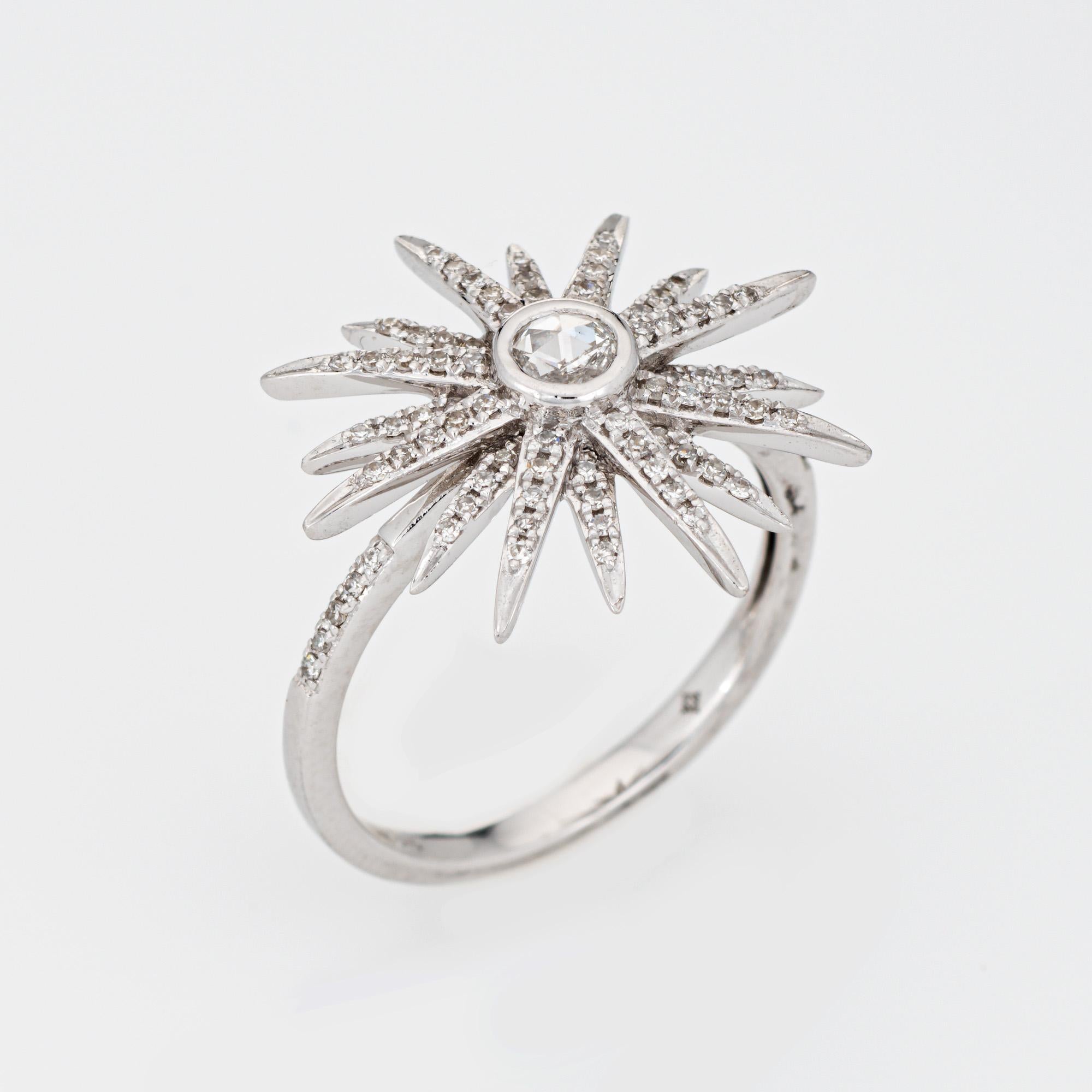 Stylish diamond starburst ring crafted in 14 karat white gold. 

Rose & single cut diamonds total an estimated 0.25 carats (estimated at L-M color and SI2-I2 clarity). 

Set with diamonds in each of the star points, the ring makes a nice statement