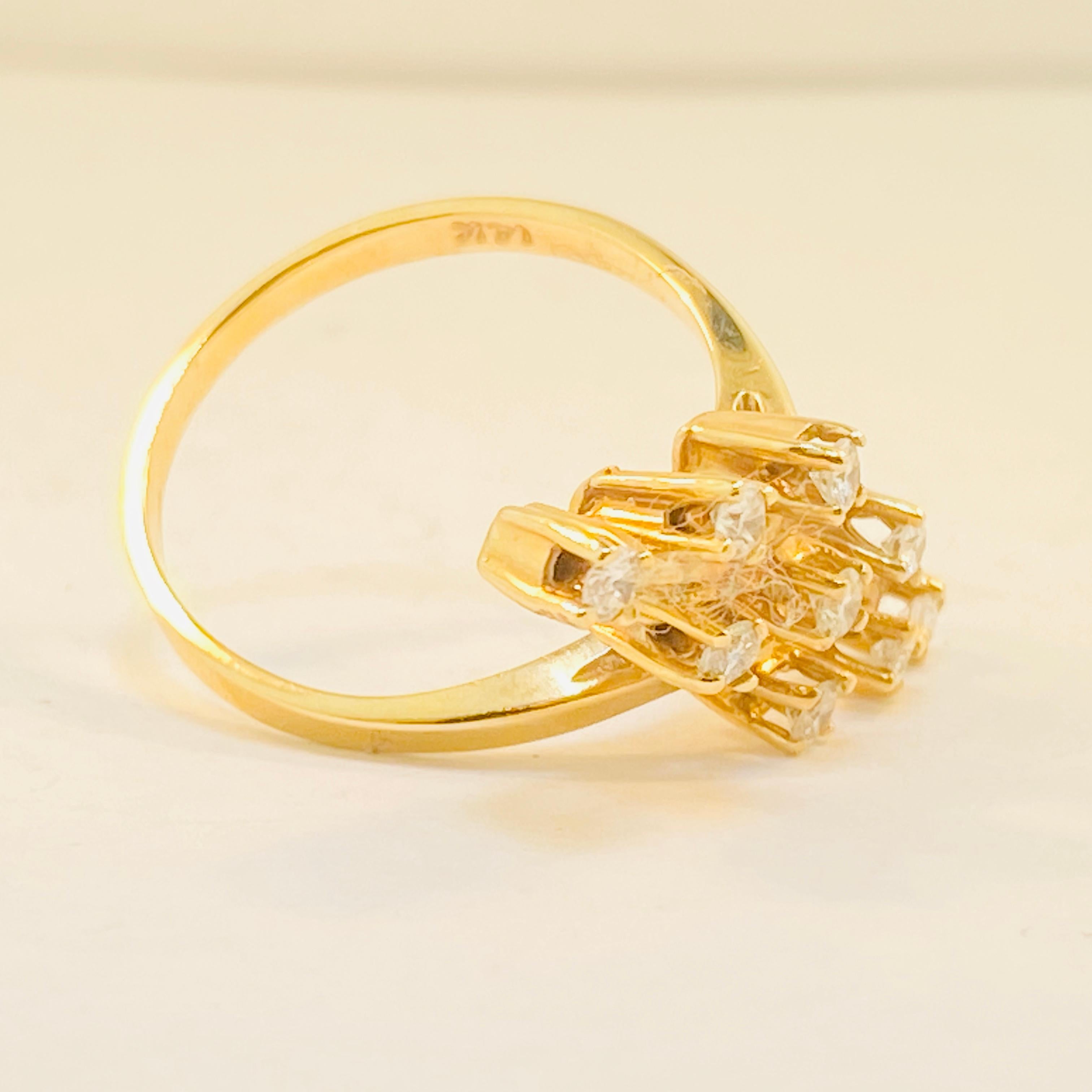 This ring has elegance and grace to it! This 14 Karat Yellow Gold Diamond ring is a gorgeous piece that will stand out anywhere you go!

14 Karat Yellow Gold
Diamonds (9) - 0.30 Total Carat Weight 
Diamond Clarity-VS1 (Excellent)
Diamond Color-G