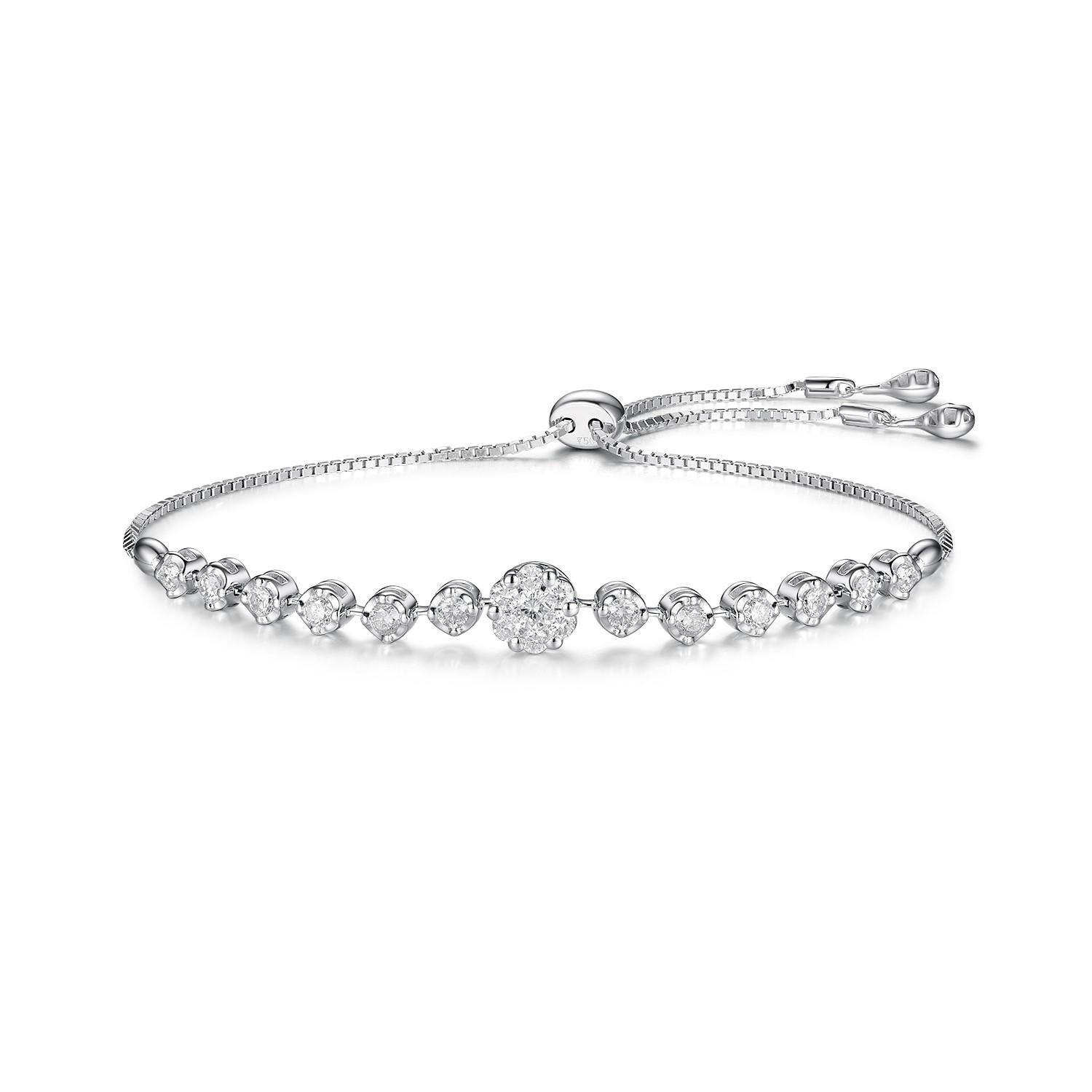 This bracelet feature stations of diamond in 18 karat white gold. 0.61 carat of the round diamond. At the end of the bracelet there's an extension hoop. 

Length 8.5 inch
18 Karat White Gold 
Diamond 0.61 carat