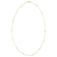 Collier station en or jaune 14 carats et diamants 1,10 carat