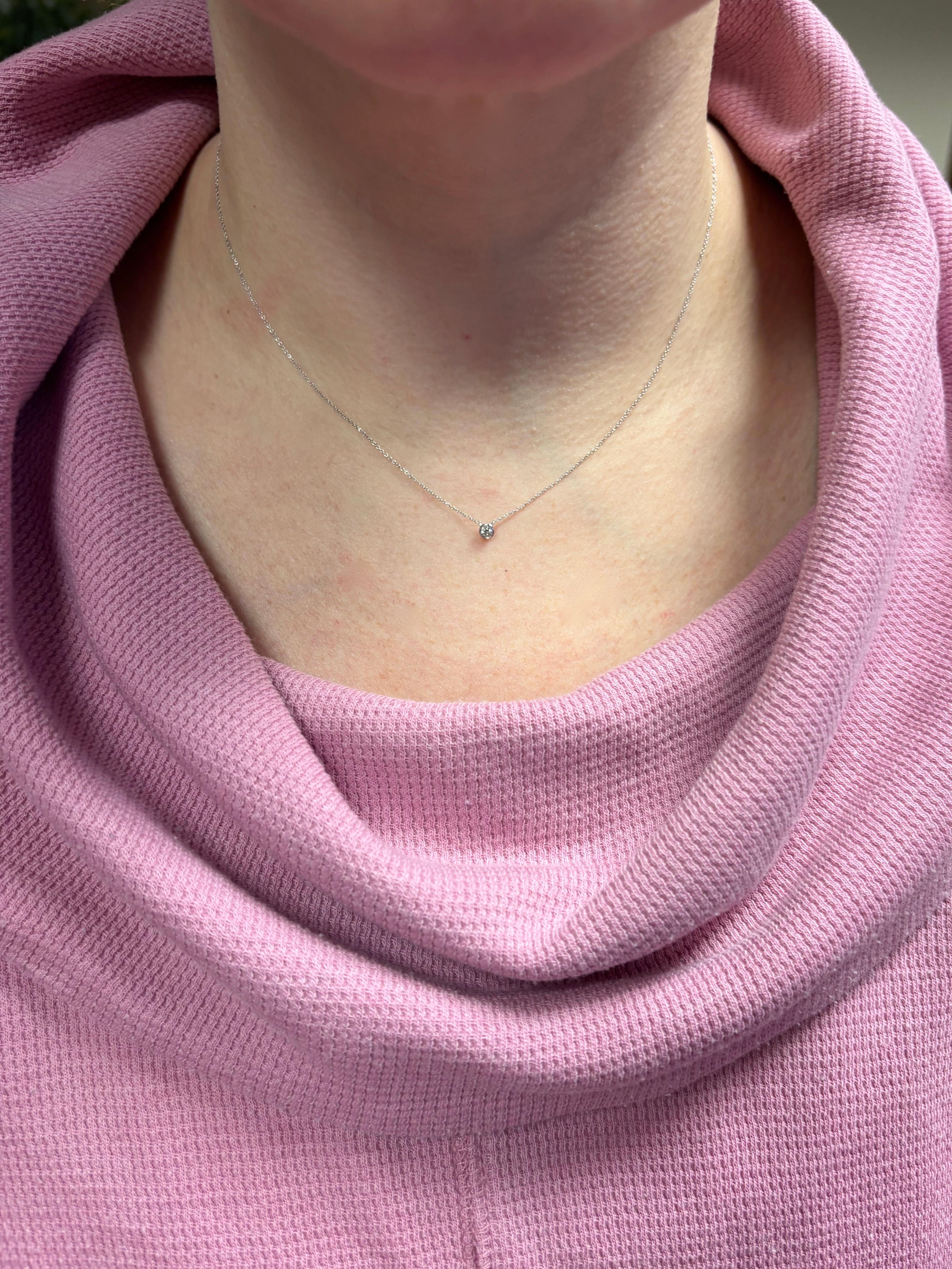 Designer Bony Levy bezel set diamond station necklace with adjustable length. 
 
Gemstone: Earth Mined Diamond
Diamond Carat Weight: .10ct 
Diamond Color: I
Diamond Clarity: SI1
Diamond Cut: Round Brilliant Cut 
Metal: 14K White Gold 
Necklace