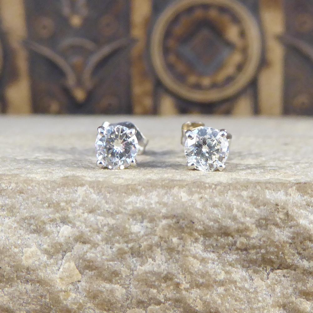 Beautiful and classic Diamond stud earrings with a total of 0.52ct. These earring shine beautifully and are crafted from 18ct White Gold settings and 14ct White Gold Butterfly backs, the perfect gift.

Diamond details:
Carat: 0.52ct total
Cut: Round