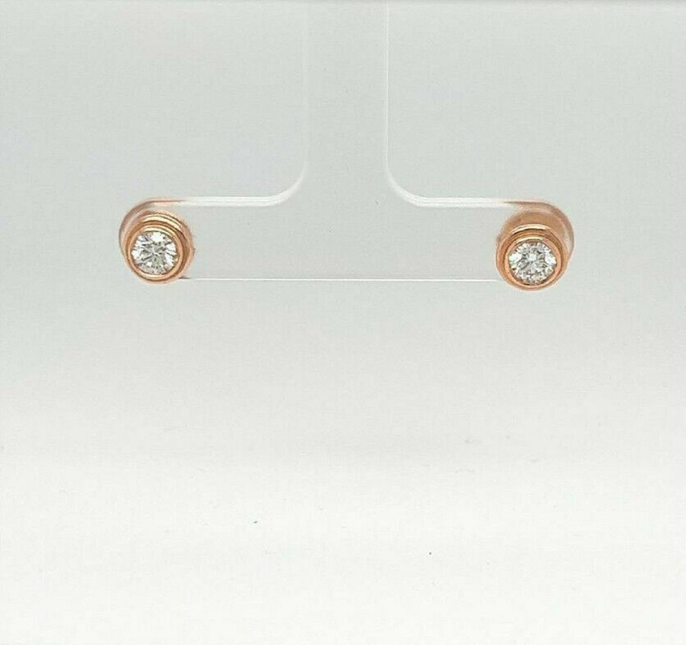 DIAMOND STUD EARRINGS 0.60 CARATS 18K ROSE GOLD

Round Diamond weighs 0.30 carat F/G Color, SI2 Clarity

Round Diamond weighs 0.30 carat F/G Color, SI2 Clarity

Total Carat Weight 0.60 carats

Set in 18K Rose Gold

Shipped in a gift box 

FREE UPS