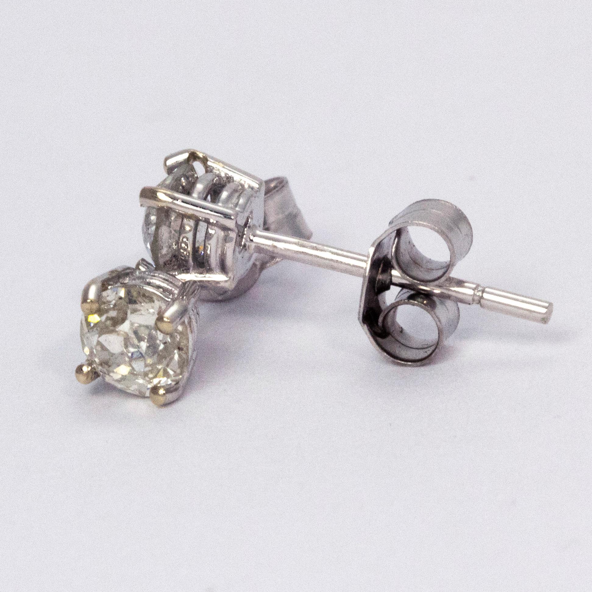 Modern Diamond Stud Earrings 0.70 Total Carat Weight Set in 18 Carat White Gold For Sale