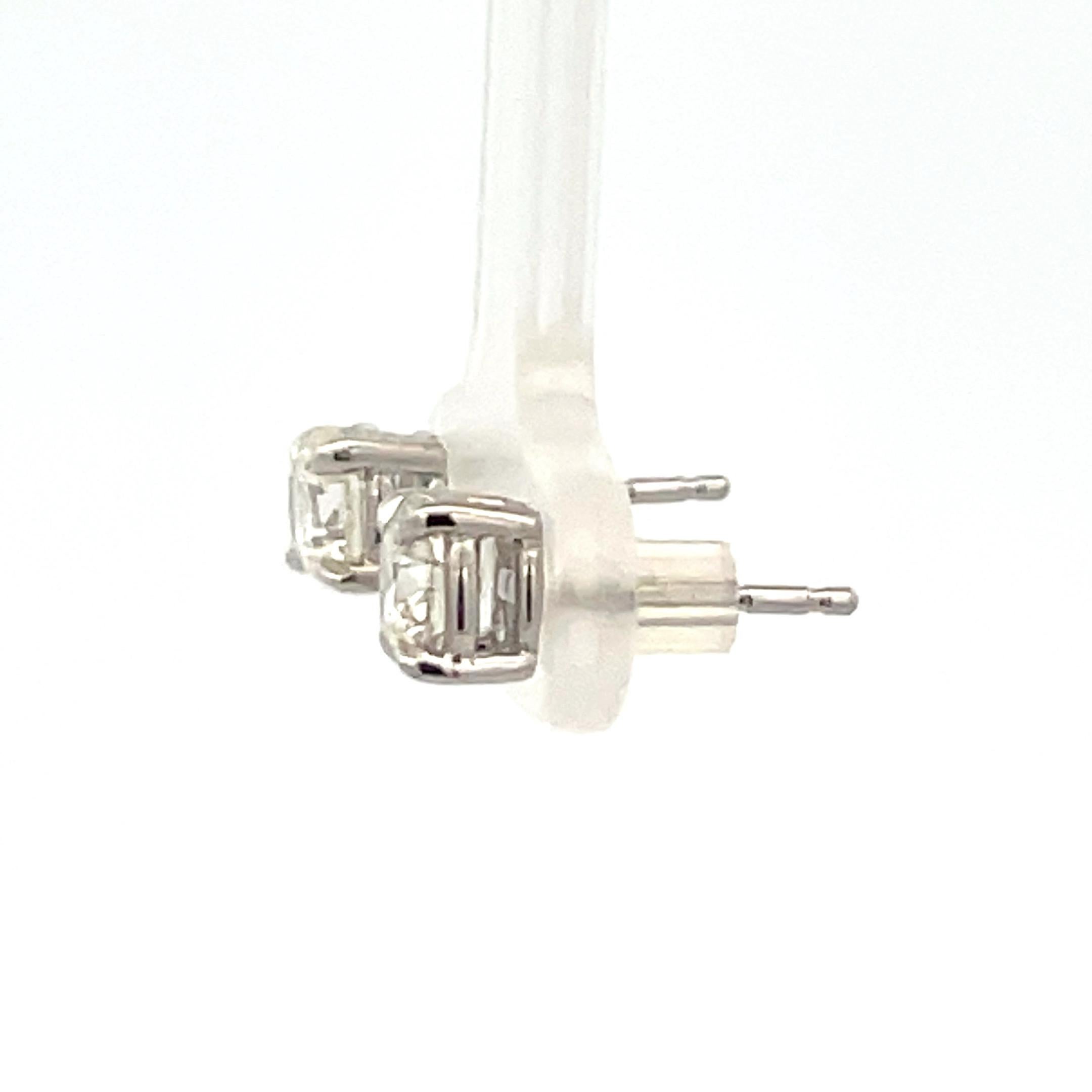 Contemporary Diamond Stud Earrings 1.13 Carats K-L I1 14 Karat White Gold Basket Setting For Sale