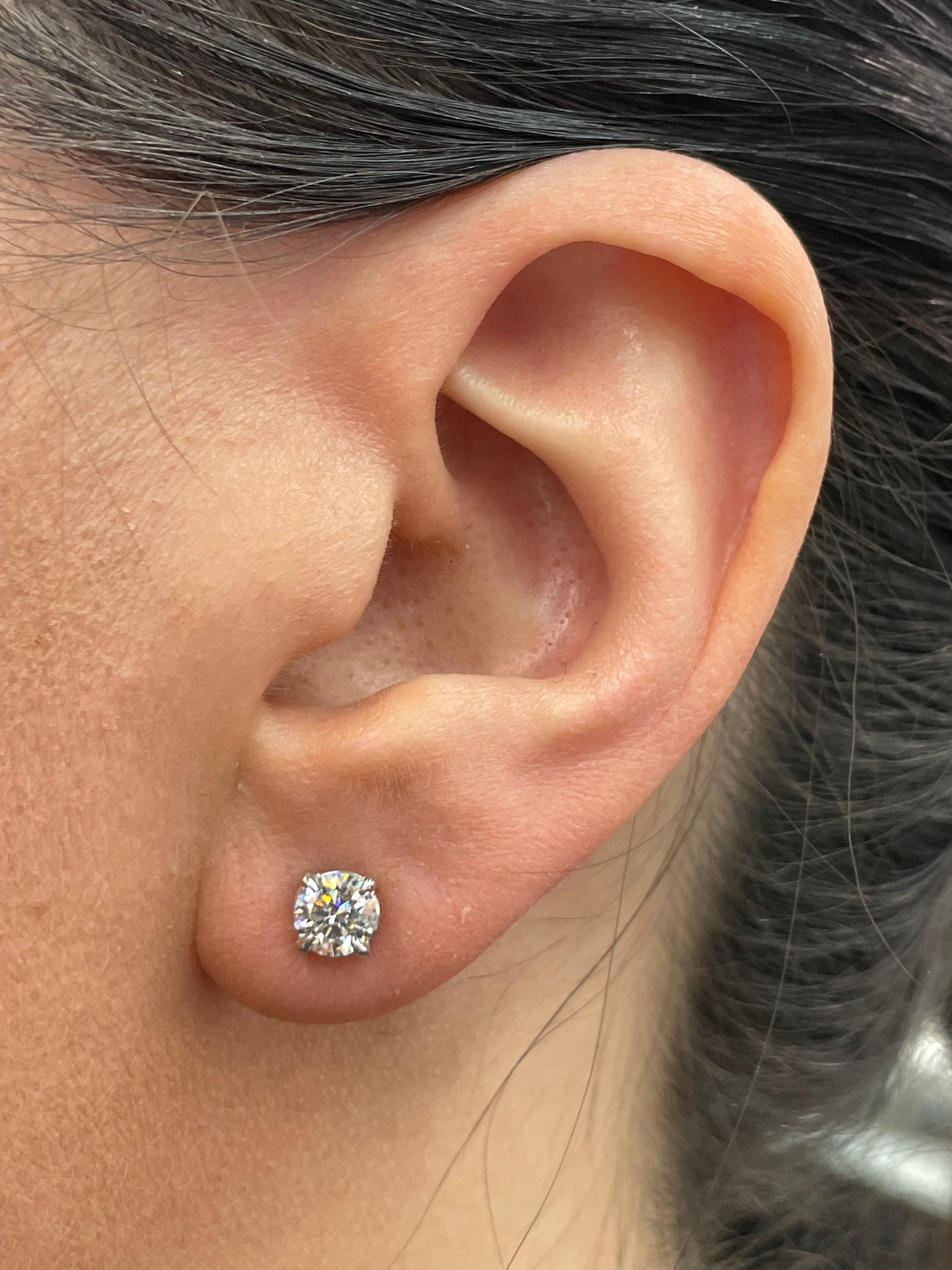 Diamond Stud Earrings 1.13 Carats K-L I1 14 Karat White Gold Basket Setting In New Condition For Sale In New York, NY