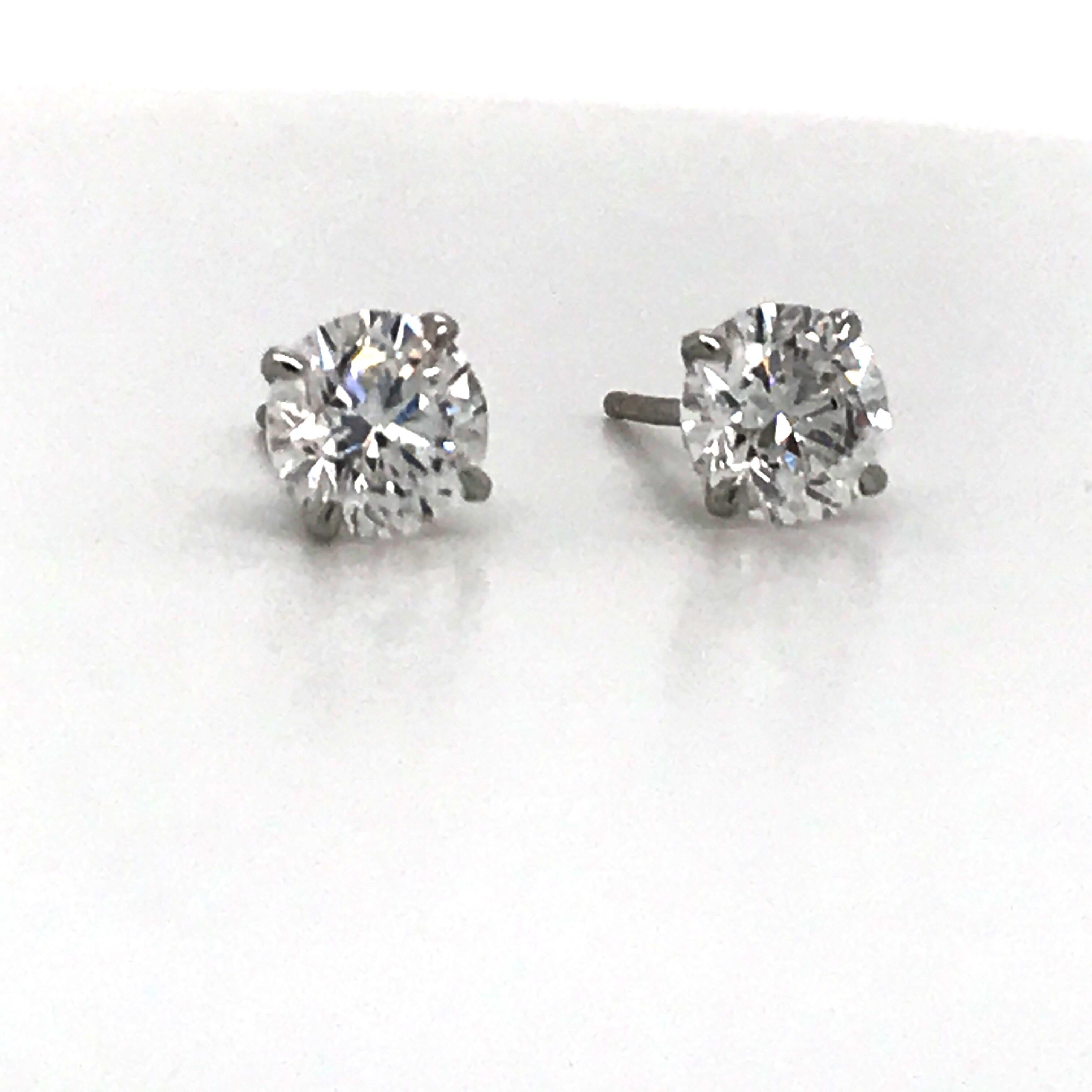 Diamond stud earrings weighing 1.40 carats in a 14k white gold 4 prong martini setting.
Color E-F
Clartiy SI2