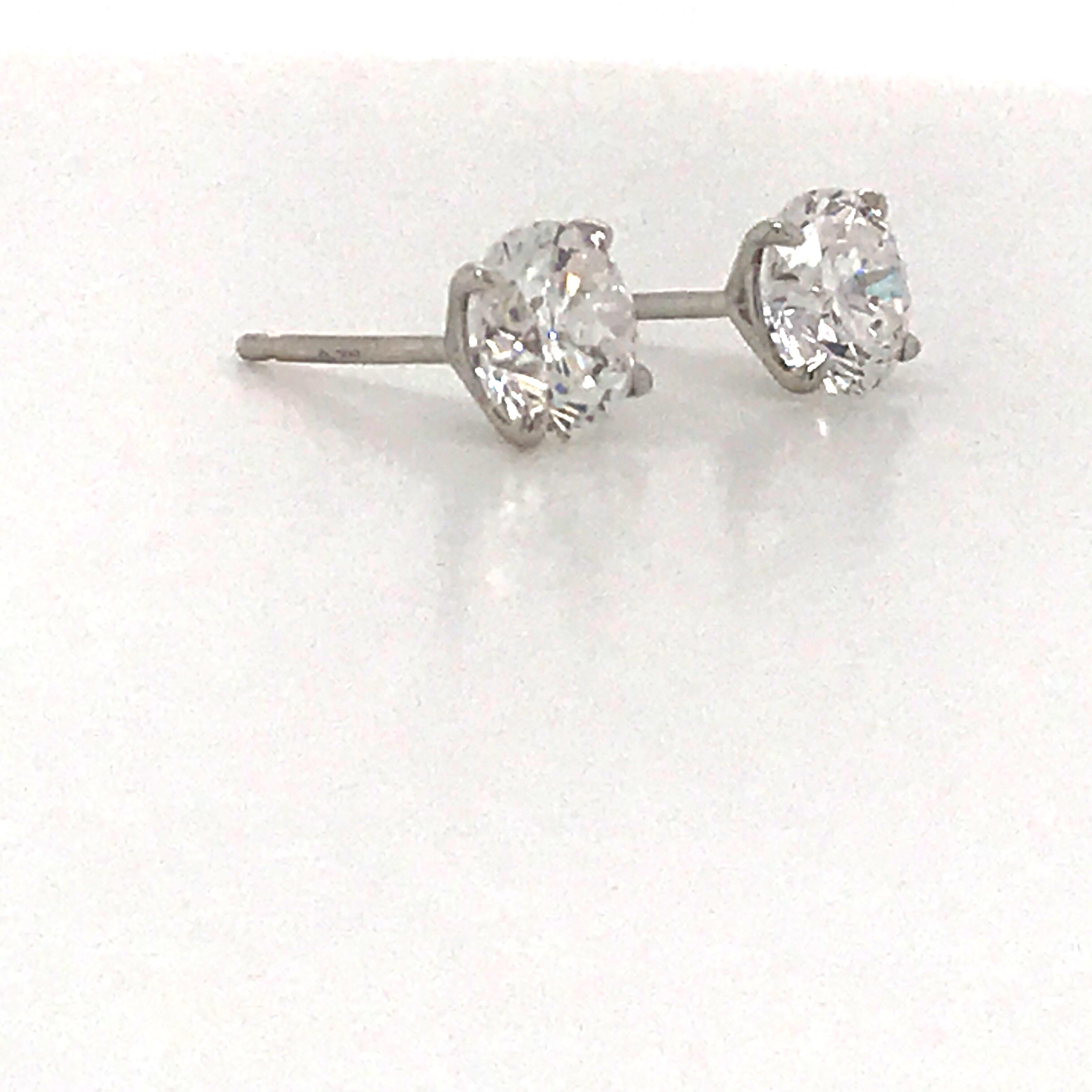 Round Cut Diamond Stud Earrings 1.40 Carat E-F SI2 14 Karat White Gold