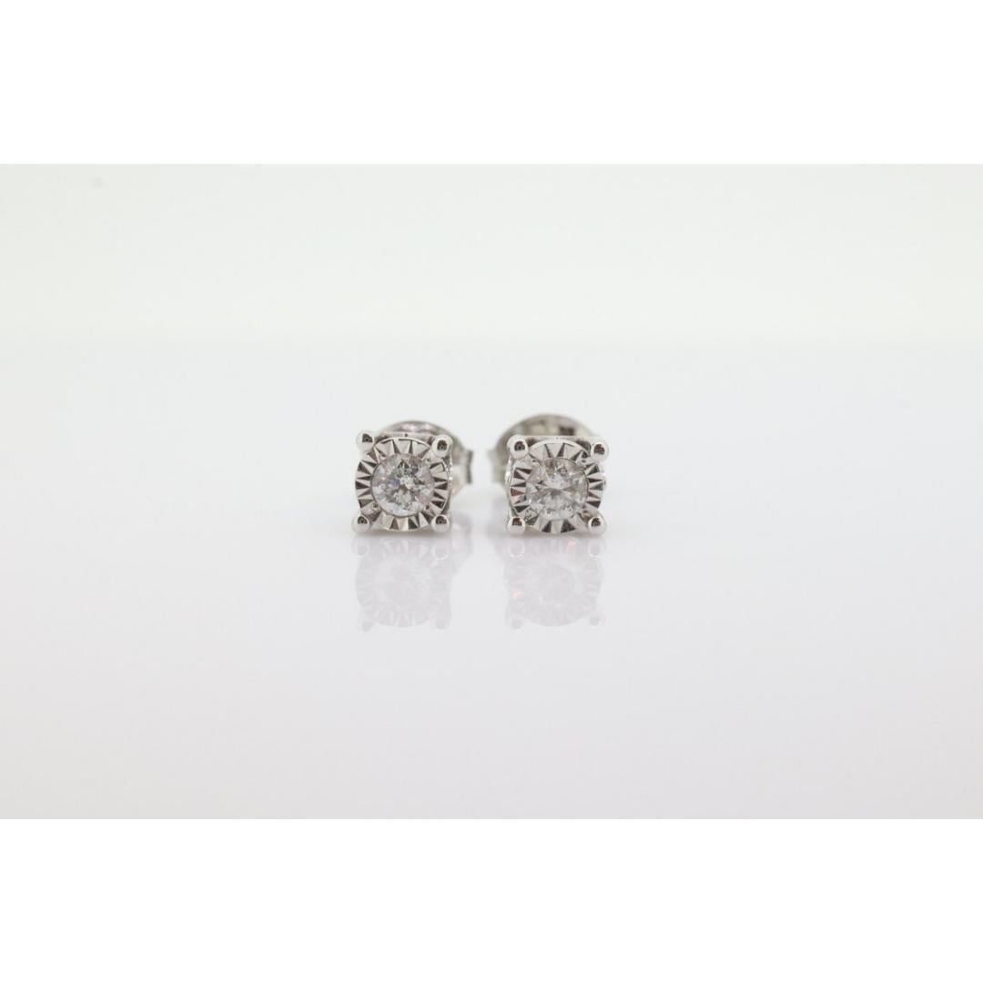Vintage
Materiales: Oro
Piedra preciosa: Diamante
Localización: Lóbulo de la oreja
Cierre: Push back

Estilo: Minimalista


Pendientes de oro blanco de 14 quilates con diamantes. Muy bonita con algunas inclusiones.

Los pendientes están totalmente