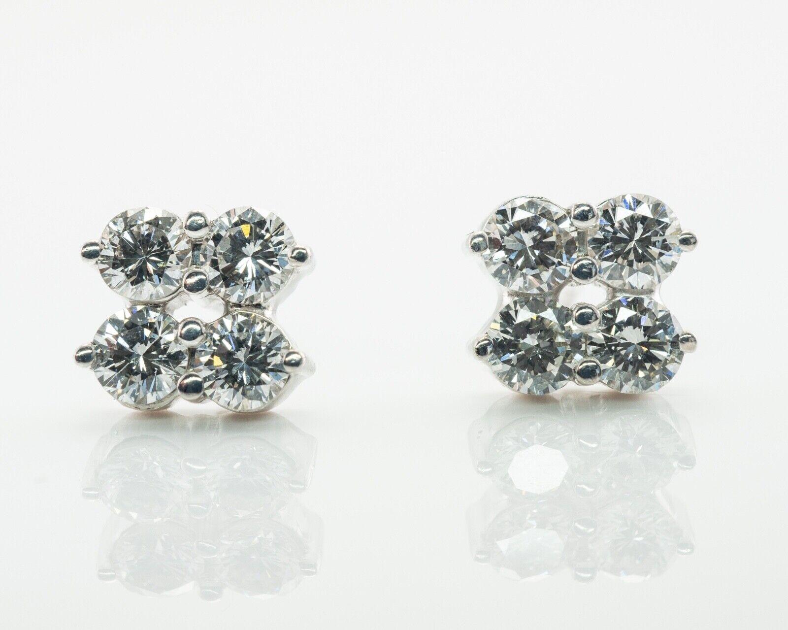 Diamond Stud Earrings 14K White Gold Vintage 1.20 TDW

These beautiful vintage solid 14K white gold stud earrings can be worn anytime, anywhere, and will make the most luxurious of gifts. These exquisite earrings feature four round brilliant cut