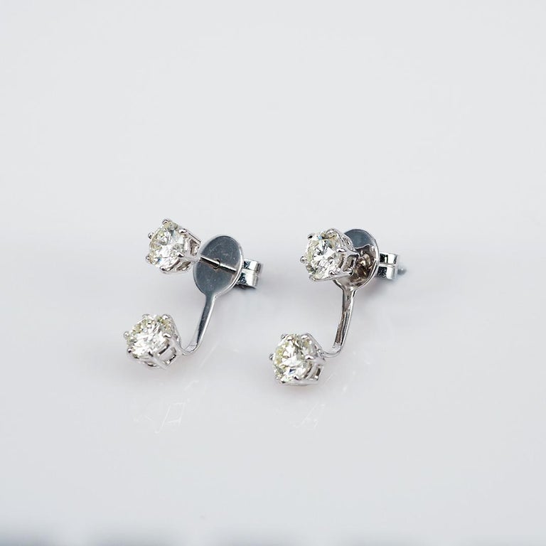 A lovely diamond earrings that you can use as everyday. This is a special design .You can use as a solitaire and you can use with 2 diamonds that you will hang in bottom as chic style.We give you 1 more extra back. Diamond use 2.08 ct J VS quality,
