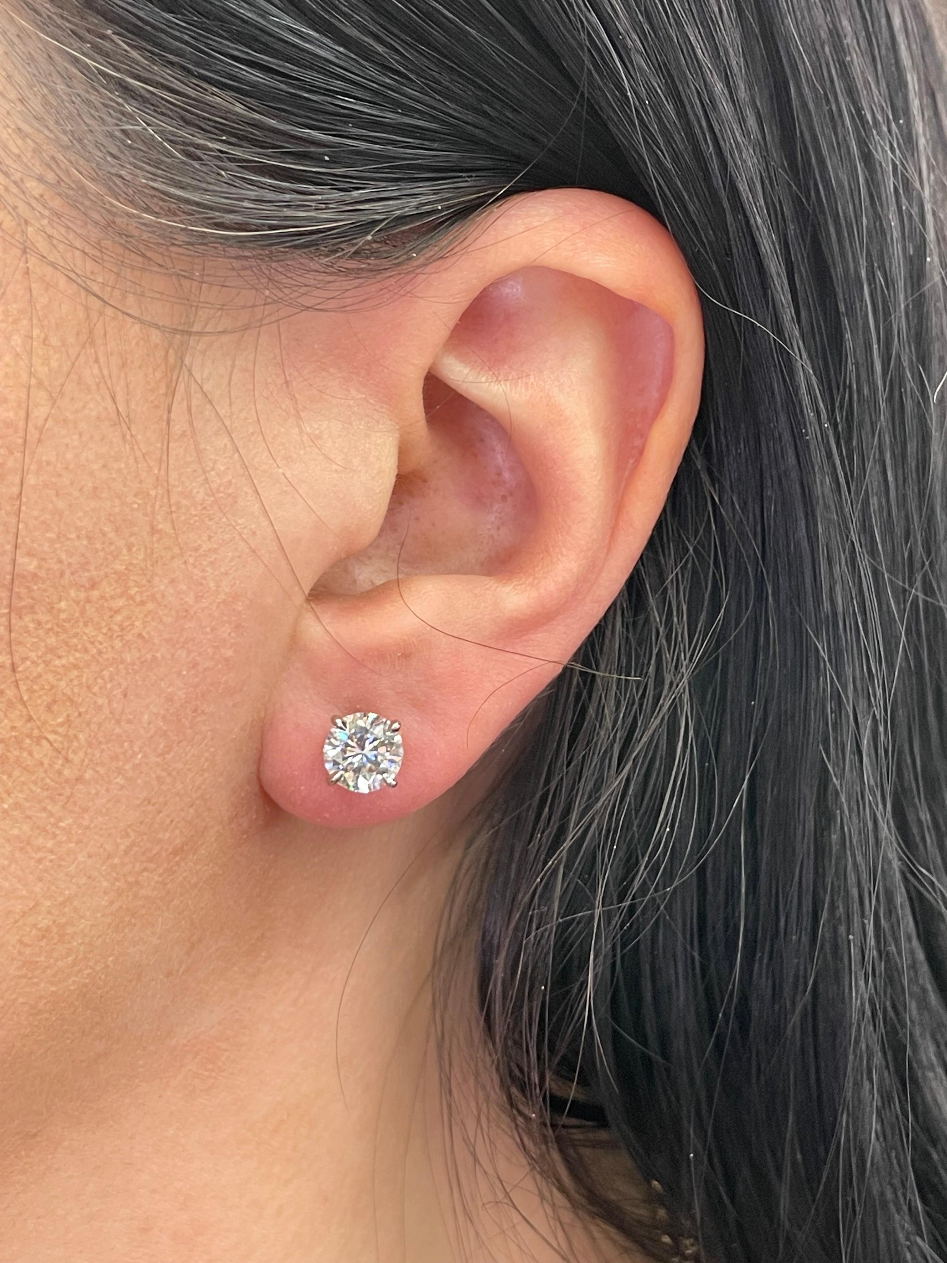 Diamond stud earrings weighing 2.01 Carats, in 18 Karat White Gold 3 Prong Champagne Setting.
Color H
Clarity I1
Nice Color, 90% Eye Clean-ish

Setting can be changed to a Basket, Martini or Champagne/ 3 or 4 Prong/ 14 or 18 Karat.

DM for more Info
