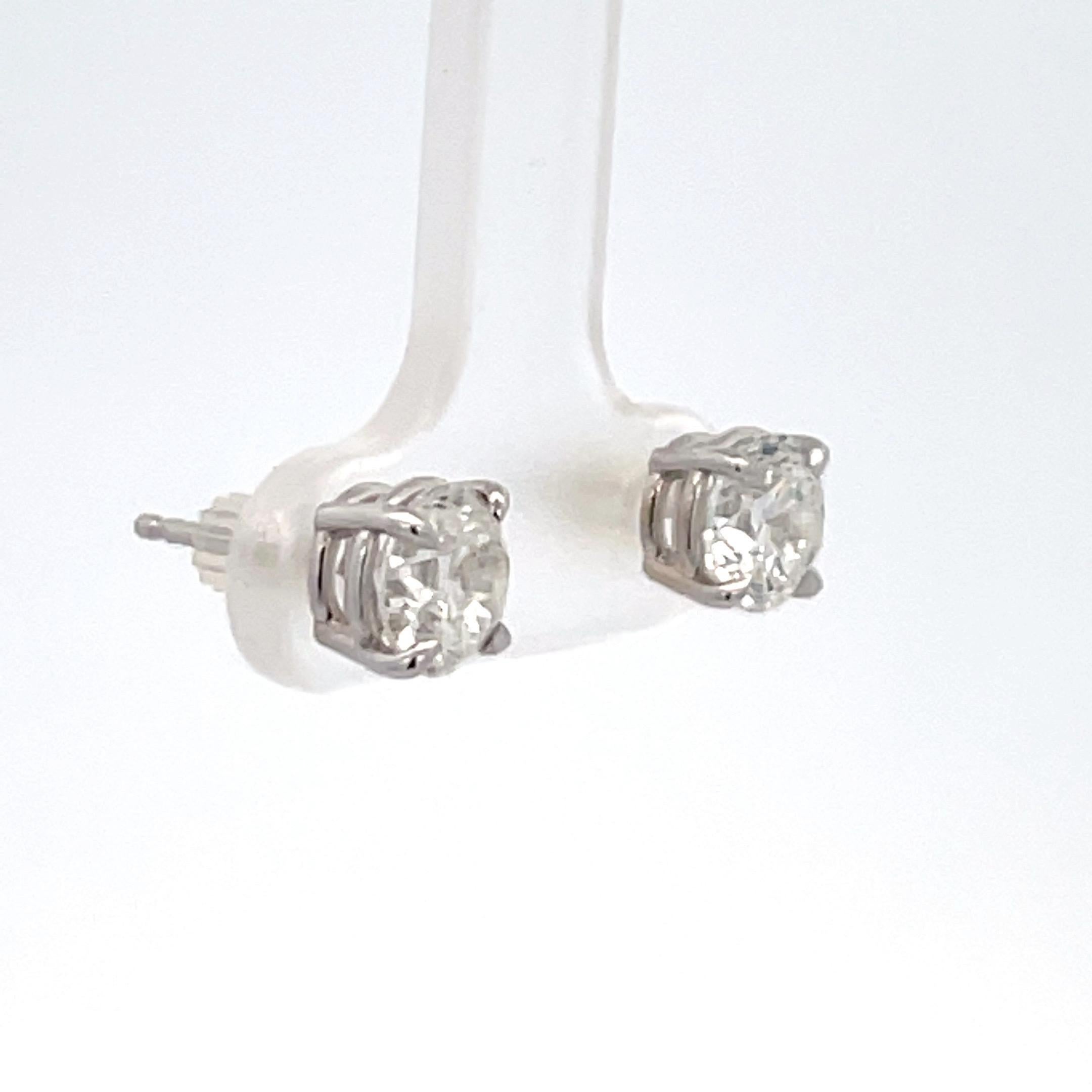 Diamond Stud Earrings 2.02 Carats H I1 14 Karat White Gold Basket Setting In New Condition For Sale In New York, NY