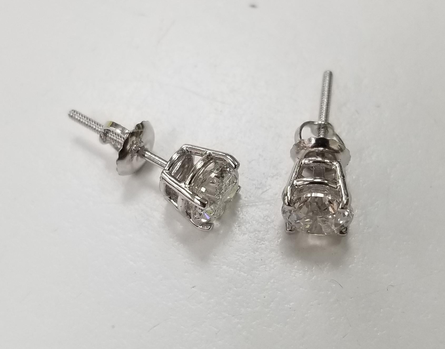 Diamant-Ohrstecker, mit 2 Diamanten im Brillantschliff; Farbe 