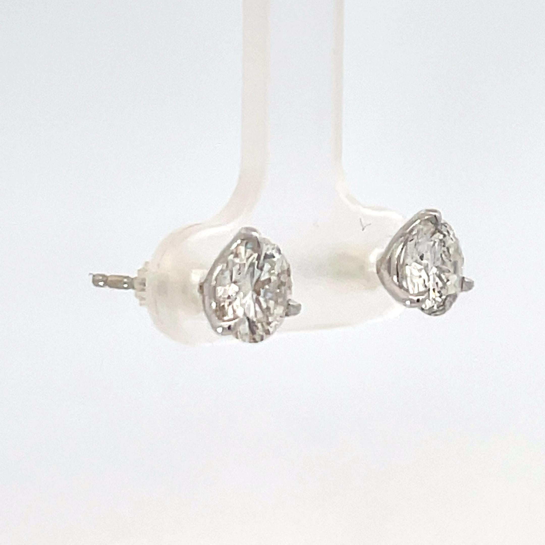 Diamond Stud Earrings 2.09 Carats H-I I1 18 Karat White Gold Champagne Setting In New Condition For Sale In New York, NY