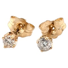 Orecchini con diamanti da .30ct, tondi e brillanti, con 4 punte, in oro giallo 14 carati