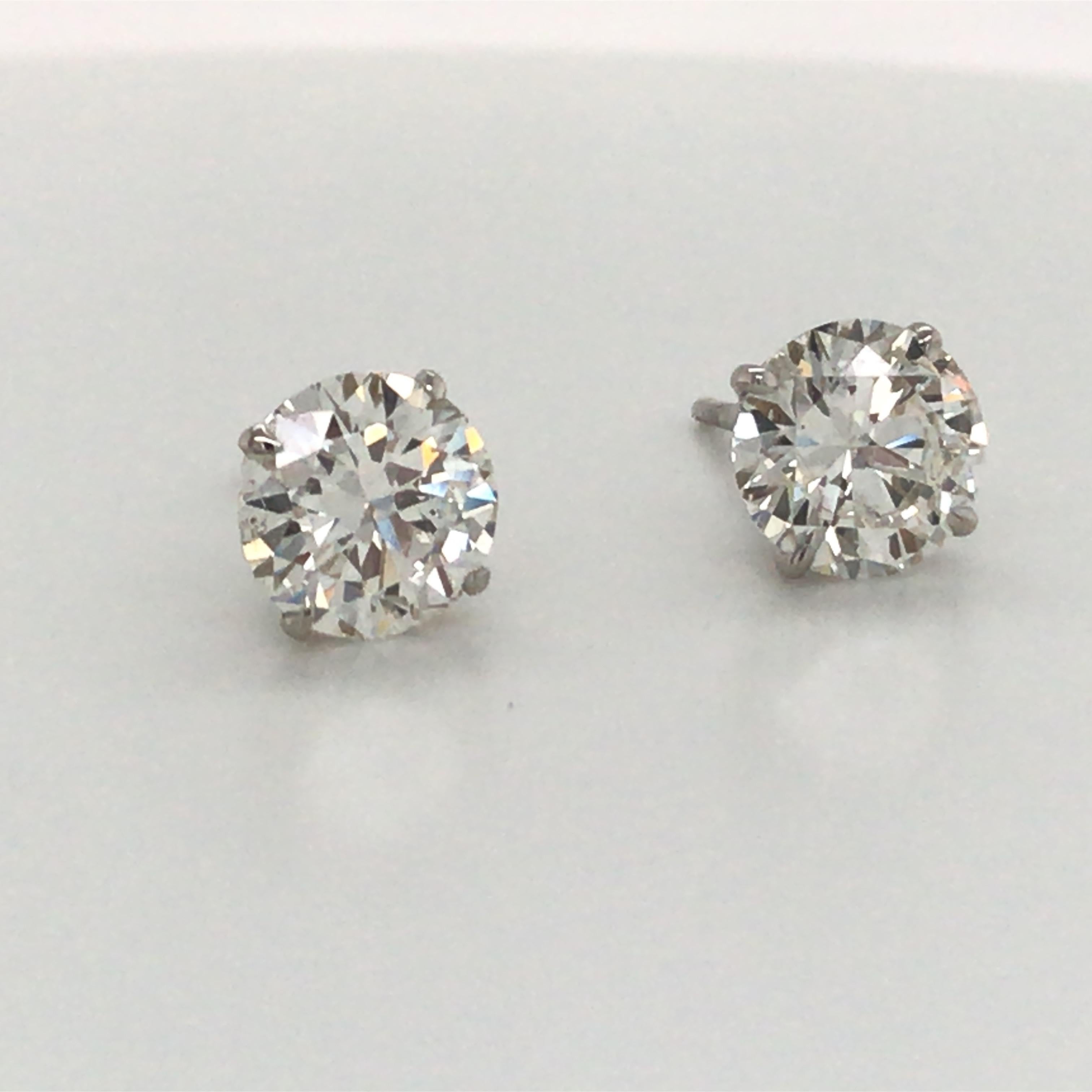 18K White Gold diamond stud earrings weighing 3.41 carats in a 4 prong champagne setting.
Color H-I
Clarity SI2-I1

Please email for additional diamond stud list. 
