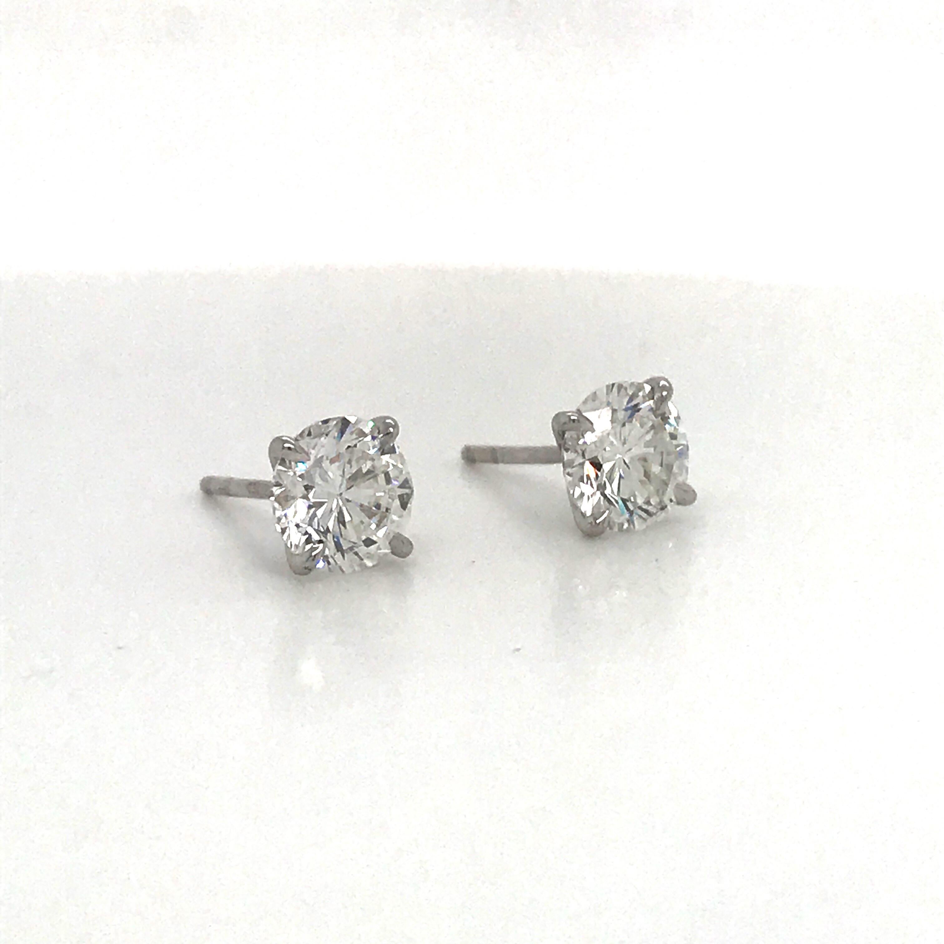 Diamond stud earrings weighing 4.03 carats in a four prong martini setting, 18K white gold.
Color I
Clarity SI2