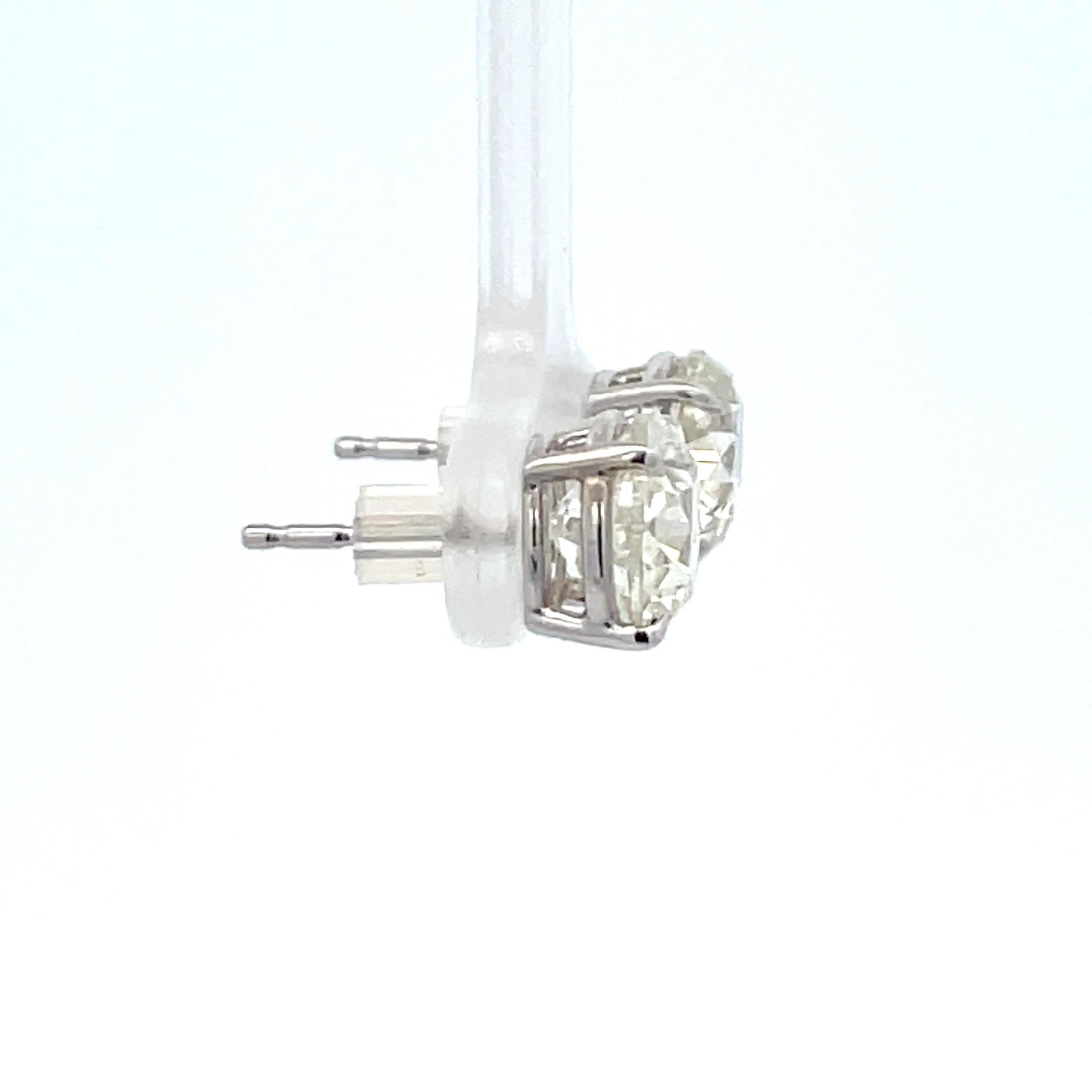 Diamond stud earrings weighing 4.04 Carats, in a 4 prong Basket setting in 14 Karat White Gold.
Color J-K
Clarity I1

Call/Message us to discuss more in detail.

Setting can be changed to a Basket, Martini or Champagne/ 3 or 4 Prong/ 14 or 18