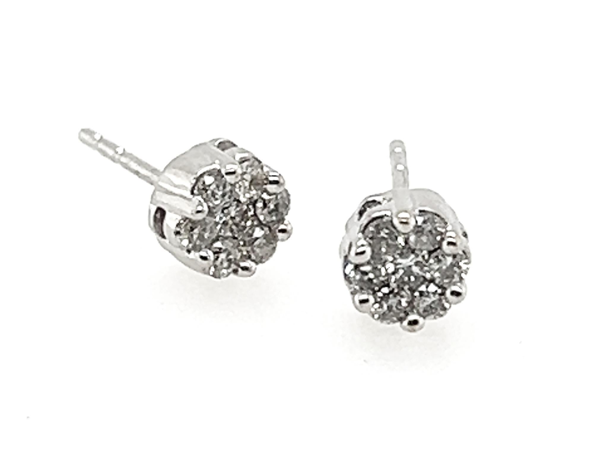 Diamond Stud Earrings .40ct White Gold F-H Cluster 


Features 14 Genuine Mined Natural Round Brilliant Cut Diamonds

Trademarked

100% Natural Mined Diamonds 

.40 Carat Diamond Weight 

Solid 10K White Gold With 14K