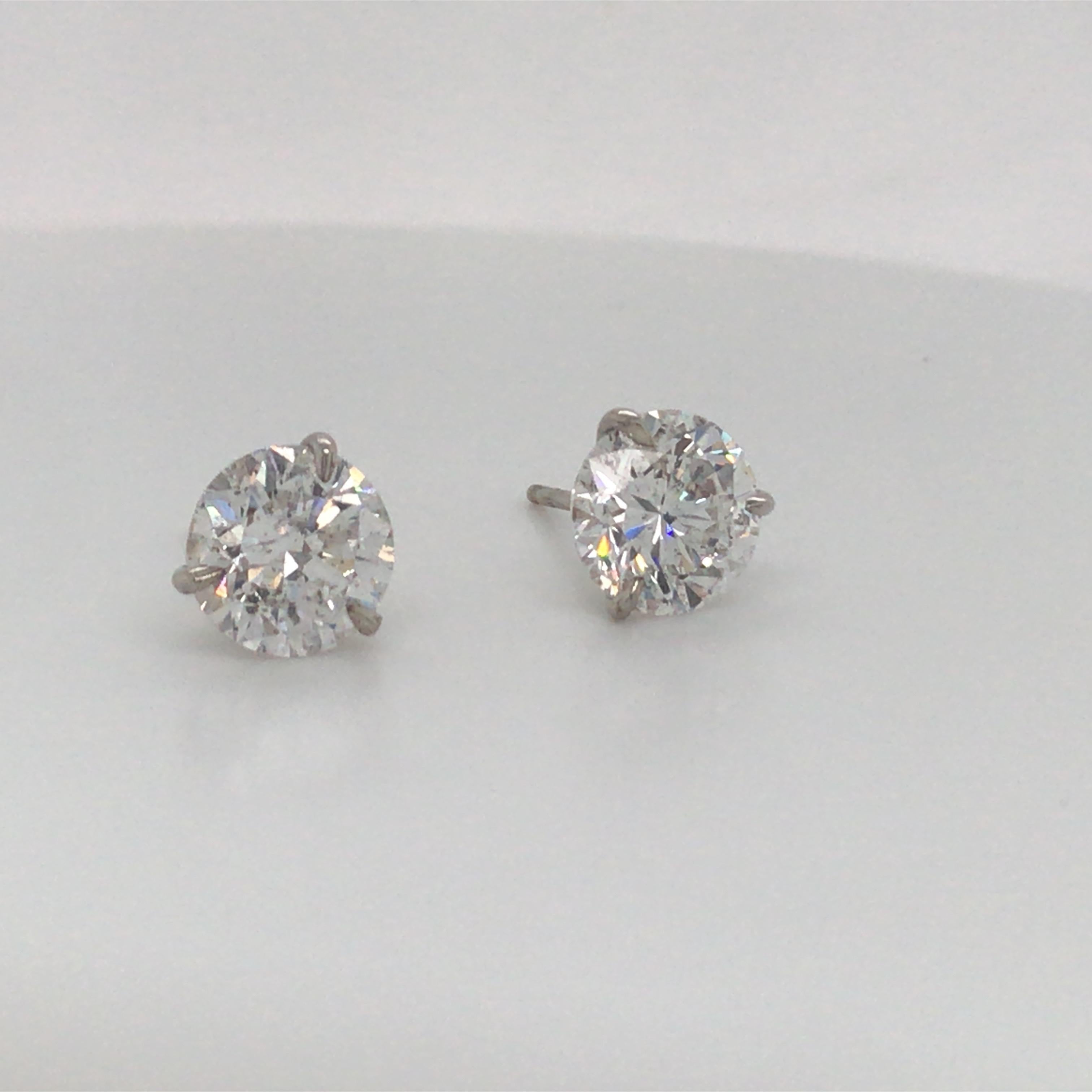 18K White gold diamond stud earrings weighing 5.04 carats in a 3 prong champagne setting.
Color F
Clarity I1

Please email for additional diamond list. 