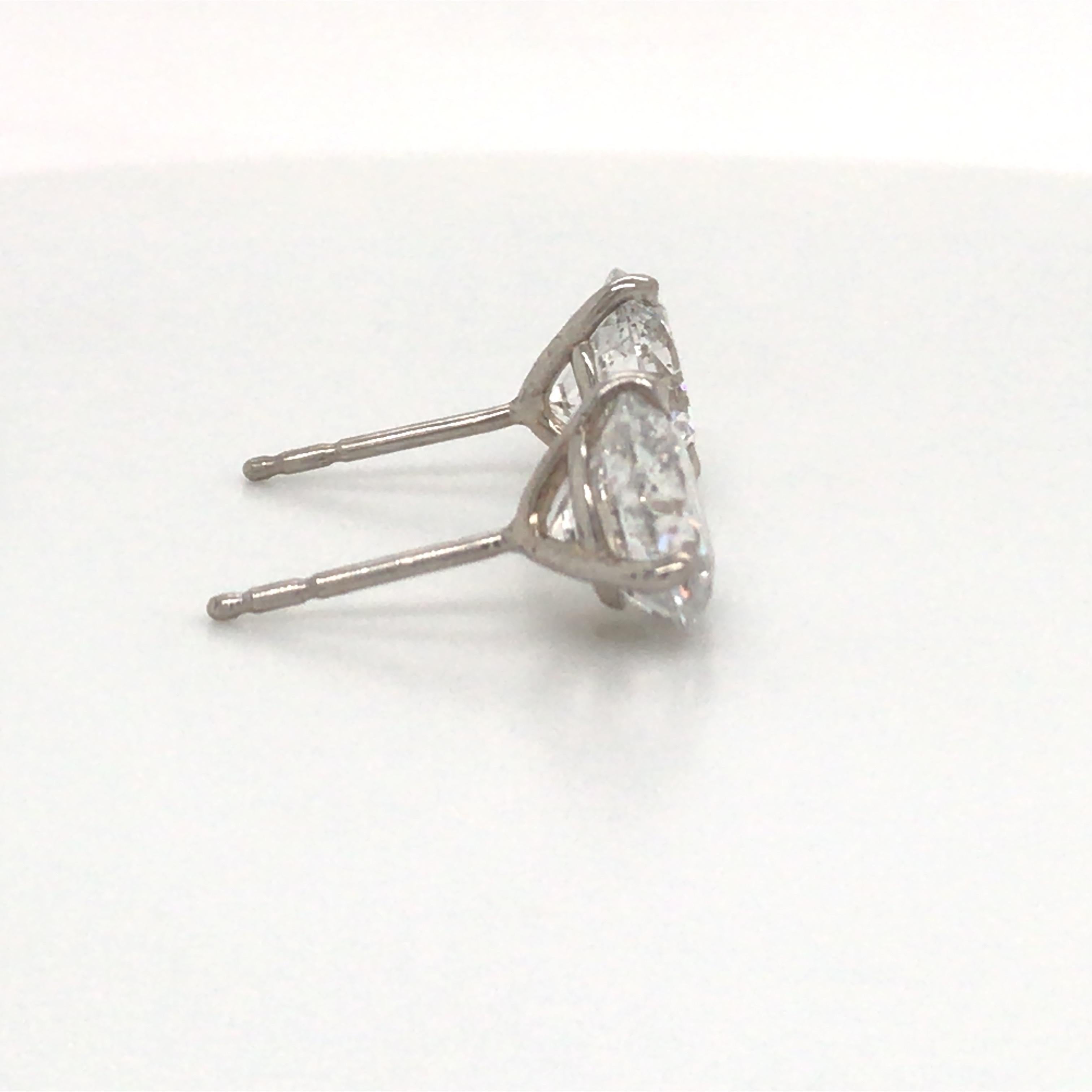 Round Cut Diamond Stud Earrings 5.04 Carat F I1 18 Karat White Gold