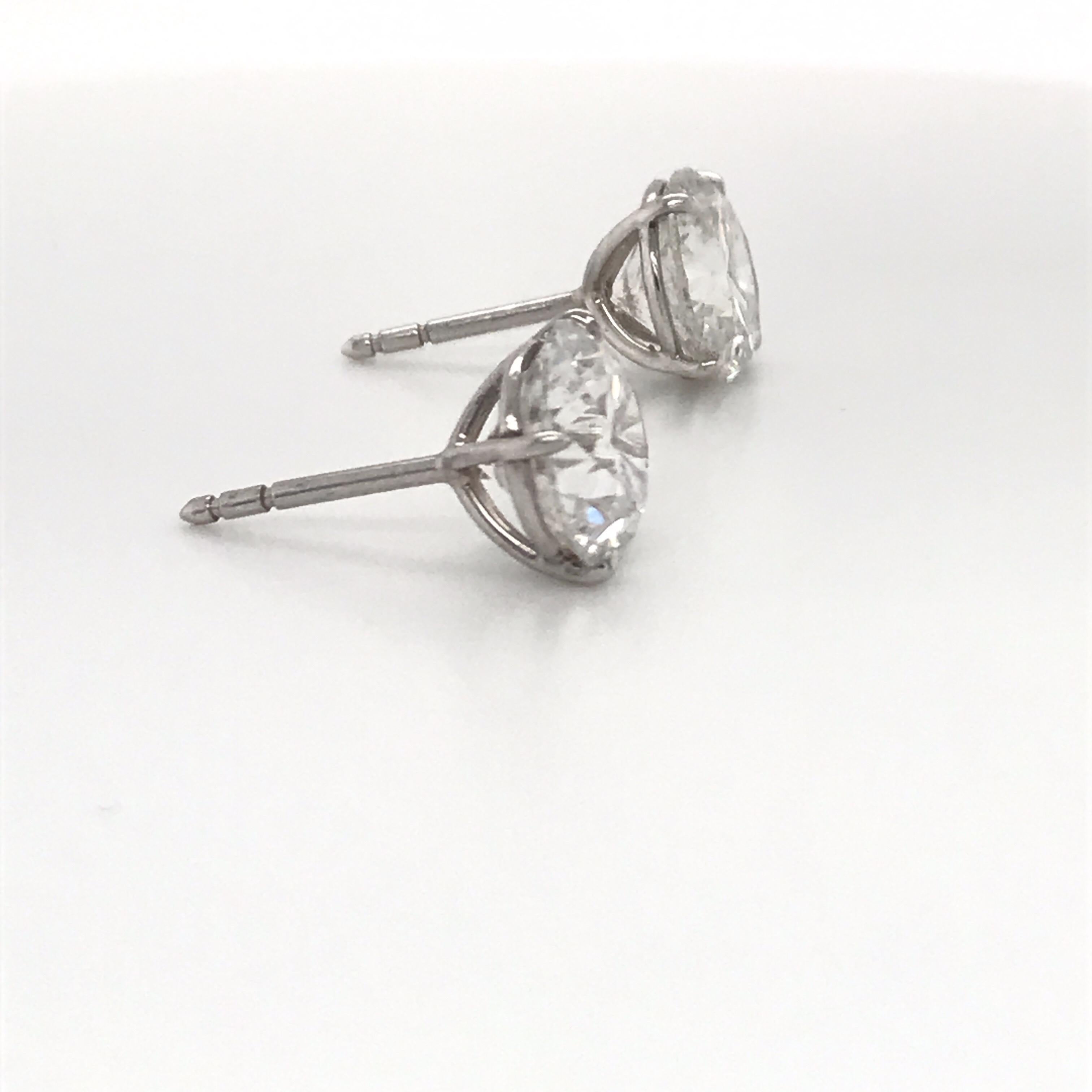 Diamond Stud Earrings 6.09 Carat G-H I1 18 Karat White Gold In New Condition In New York, NY