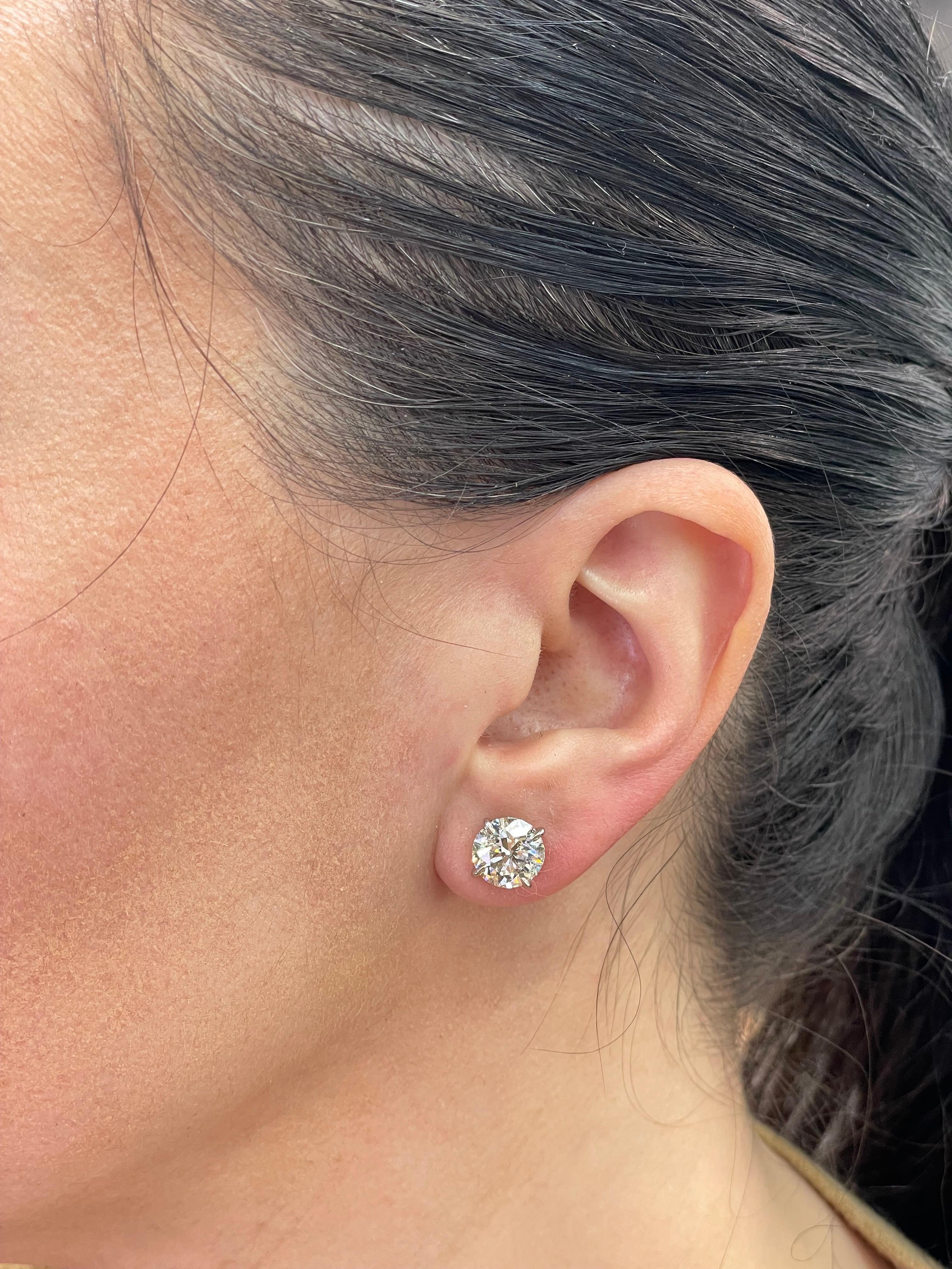 Diamond stud earrings weighing 6.12 Carats in a 4 prong Champagne setting crafted in Palladium.
Color L
Clarity I1 
Full of Life & Clean to the Eye, Nice Shine!
Call/Message us to discuss more in detail.

Setting can be changed to a Basket, Martini