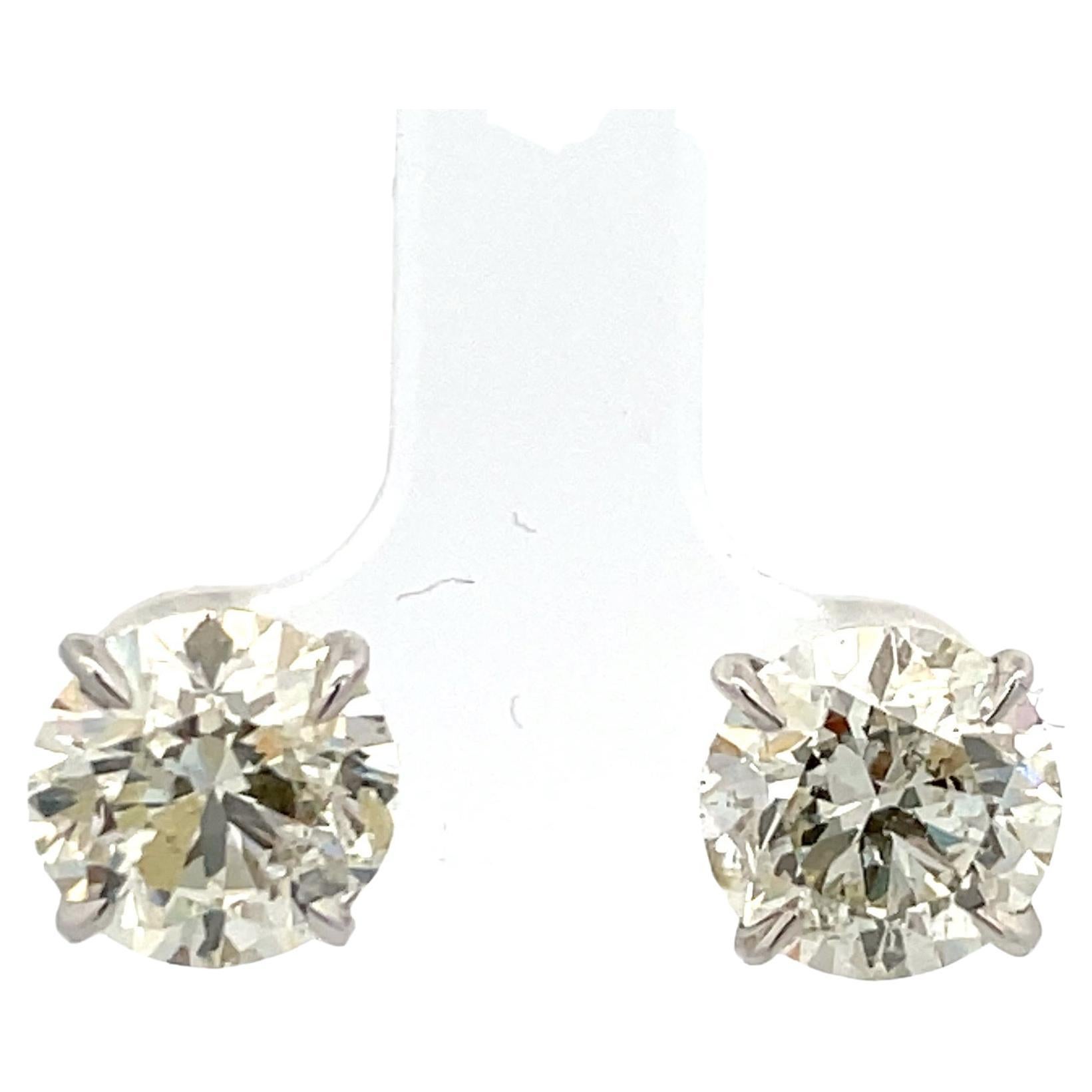 Diamond Stud Earrings 6.12 Carats L I1 Champagne Setting Palladium