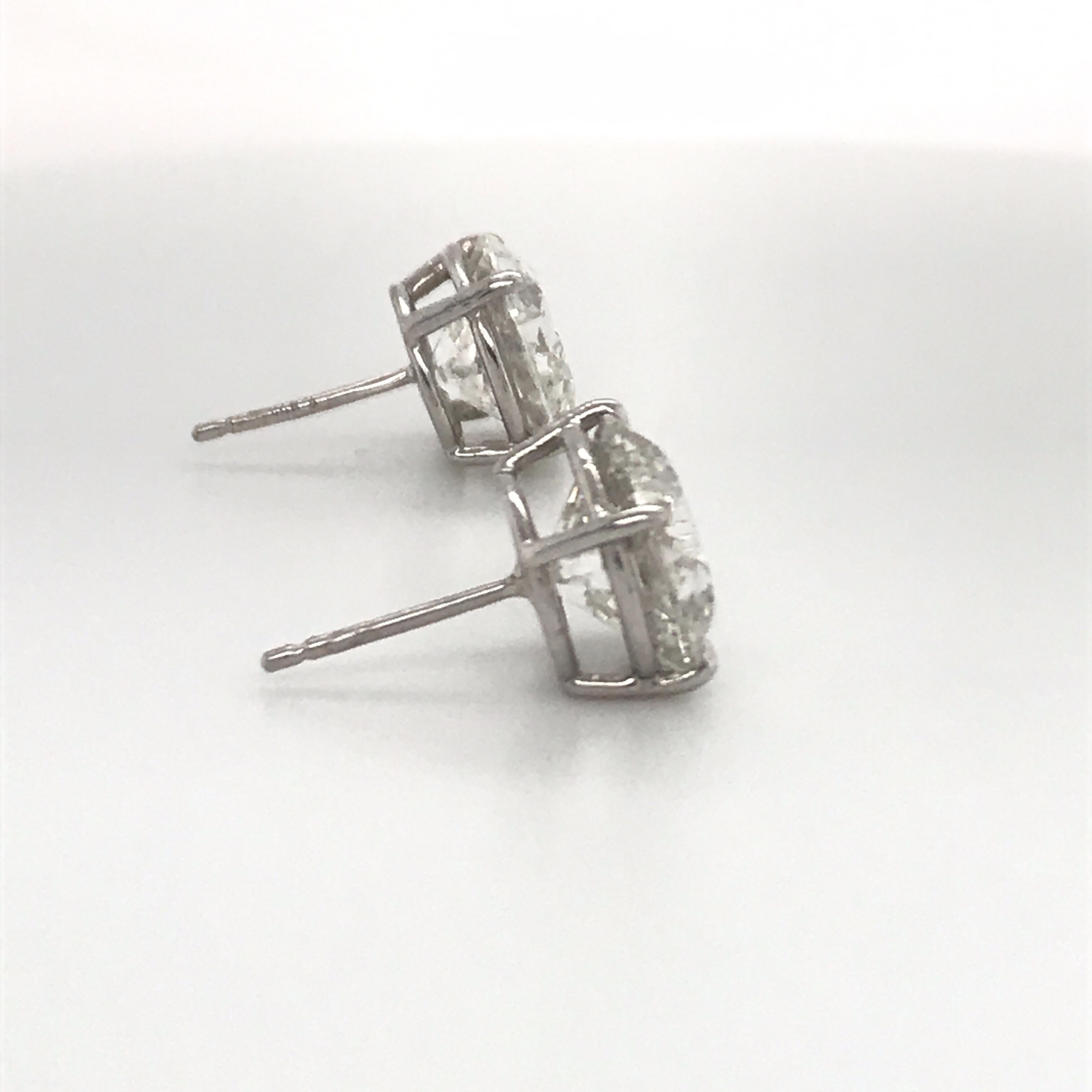Contemporary GIA CERTIFIED Diamond Stud Earrings 6.12 Carat H-I I1 14 Karat White Gold