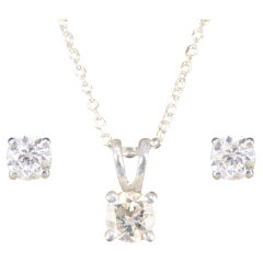 Diamant-Ohrstecker und Halskette aus Weißgold mit Diamanten