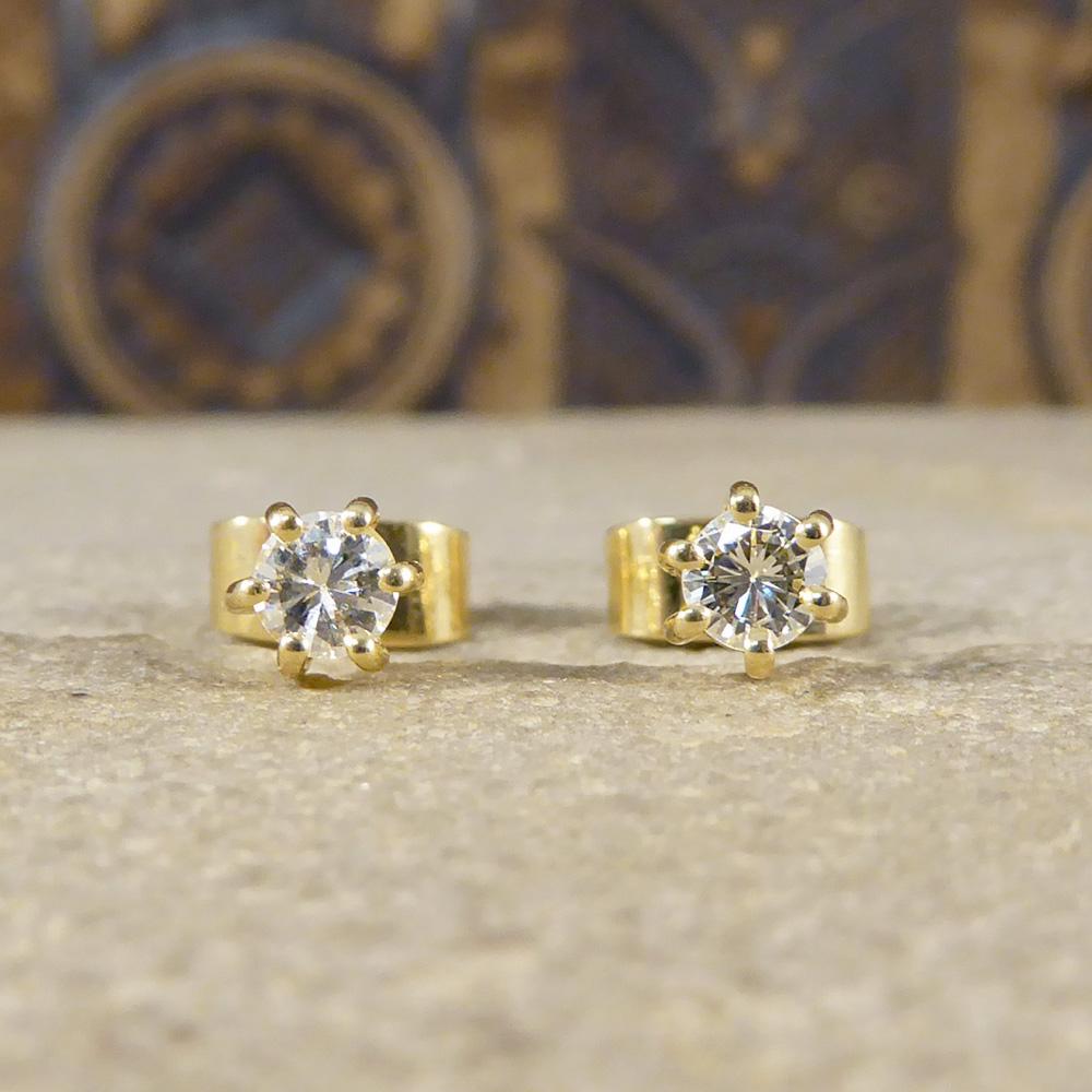 These stunning Diamond stud earrings are a classic piece that will compliment any outfit. Each stud sits a single Diamond weighing 0.15ct in an 18ct Yellow Gold six claw setting with butterfly backs. The perfect gift. 

Diamond details:
Cut: Round