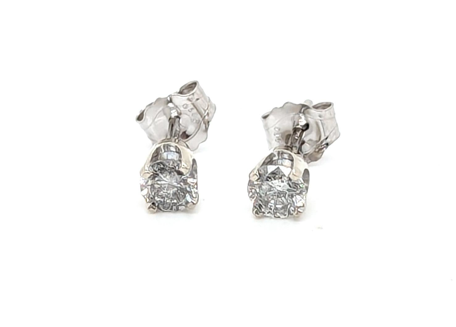 Diamond Stud Earrings Mined 1/3ct Round Brilliant Cut 14K White Gold Pushback



Features 2 Genuine Natural Mined Round Brilliant Cut Diamonds 

Classic Diamond Studs

100% Natural Mined Diamonds 

.33 Carat Diamond Weight 

14K White Gold

Great