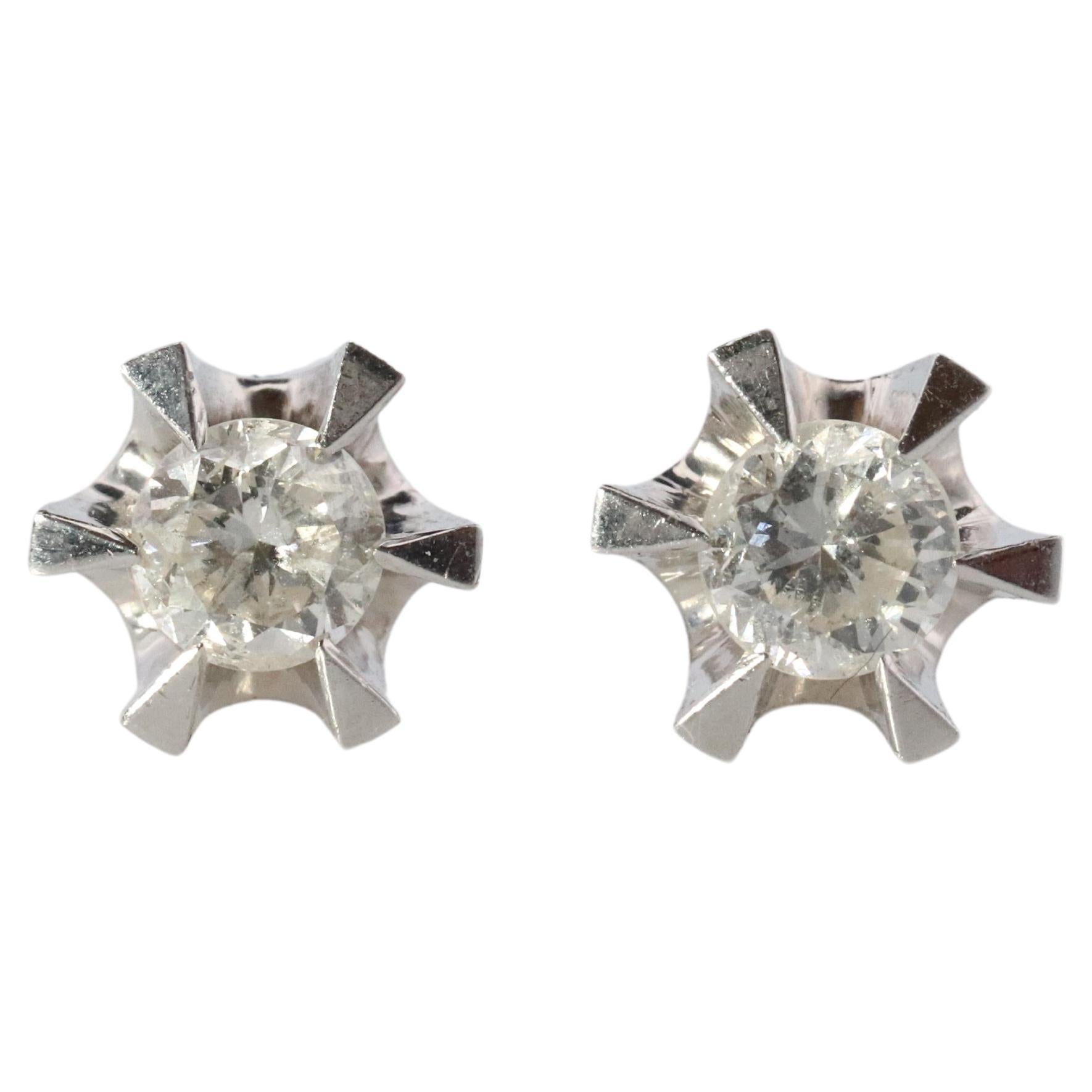 Diamant-Ohrstecker. Platin PT900 1/2ct Diamant Gürtel-Klauen-Ohrstecker aus Platin.